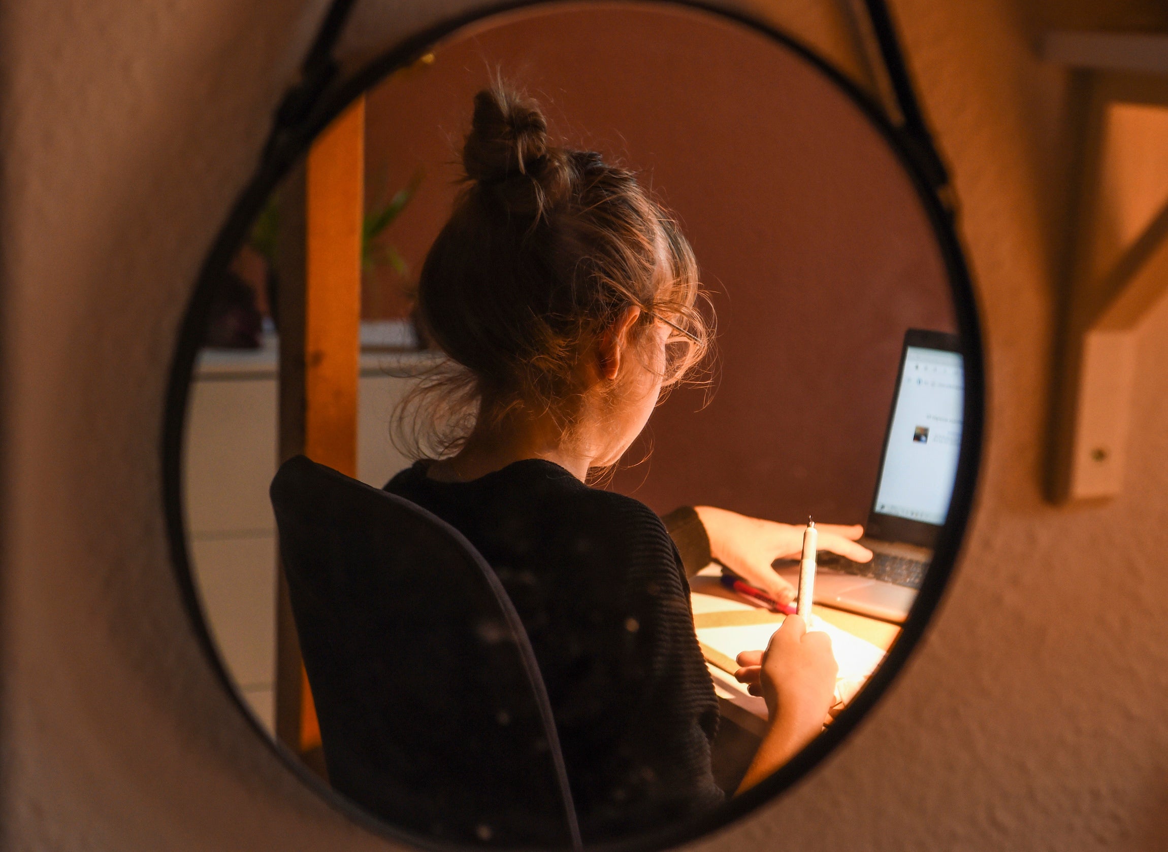 A girl studies online at home during Covid-19 school closures in Berlin.
