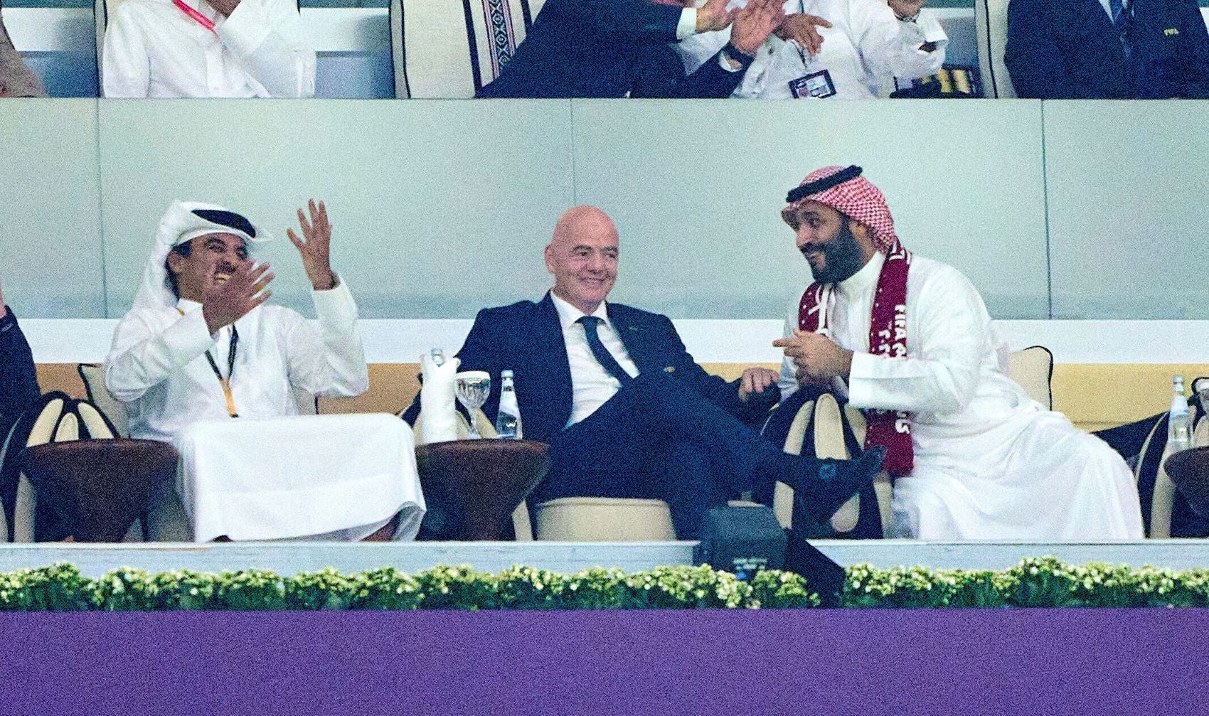 Emir and President of Qatar Sheikh Tamim bin Hamad Al Thani, FIFA President Gianni Infantino, and Saudi Arabia's Crown Prince Mohammed bin Salman al-Saud at the 2022 Qatar World Cup, on November 20, 2022, in Al Bayt Stadium in Doha, Qatar.