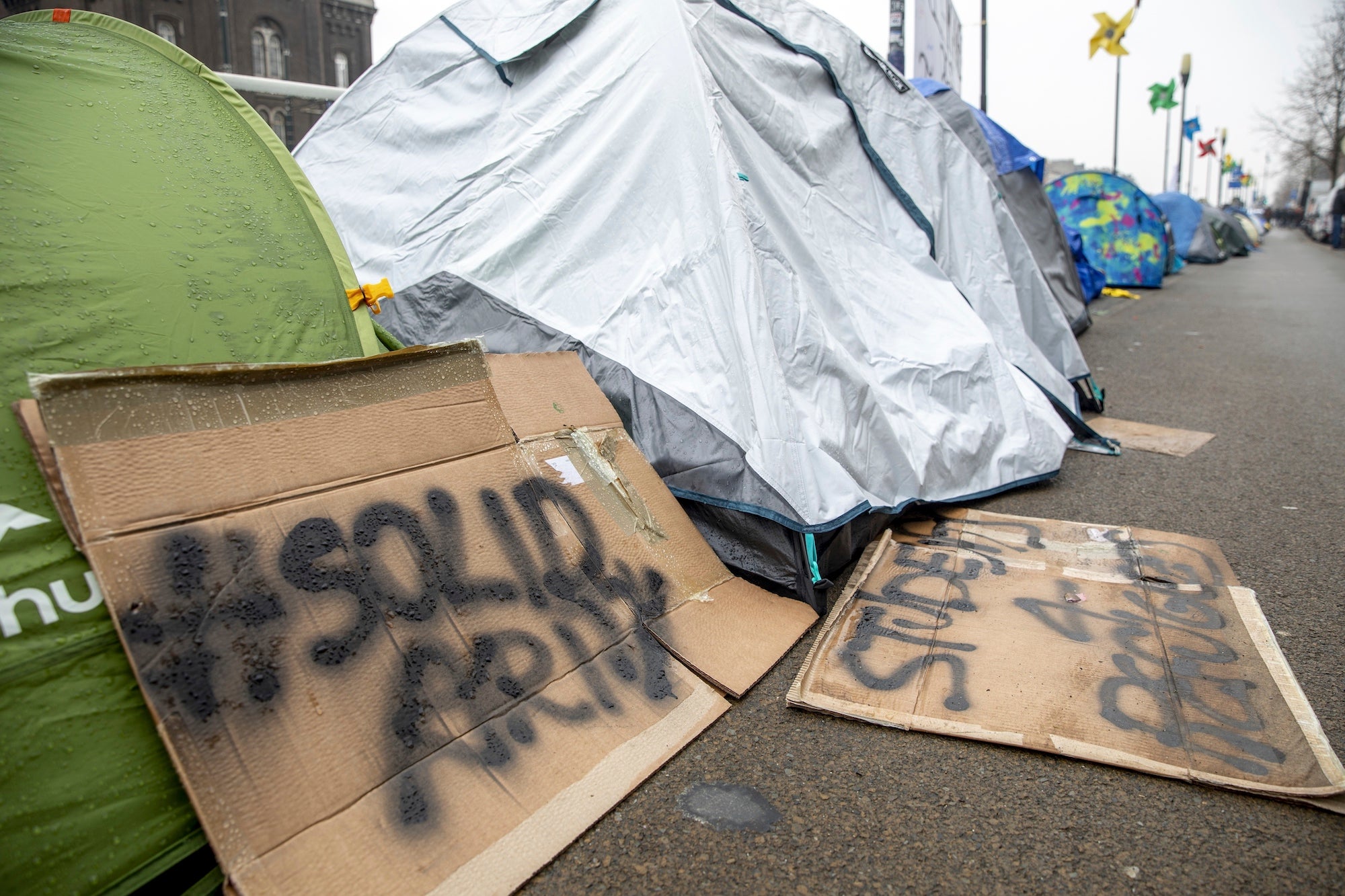 Tents in front of the Petit Chateau - Klein Kasteeltje Fedasil Arrival center, in Brussels.