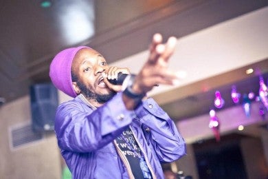 Zimbabwean reggae-dancehall artist Wallace Chirumiko, known as Winky D, performs at the Africa Unplugged festival in London, August 27, 2012.