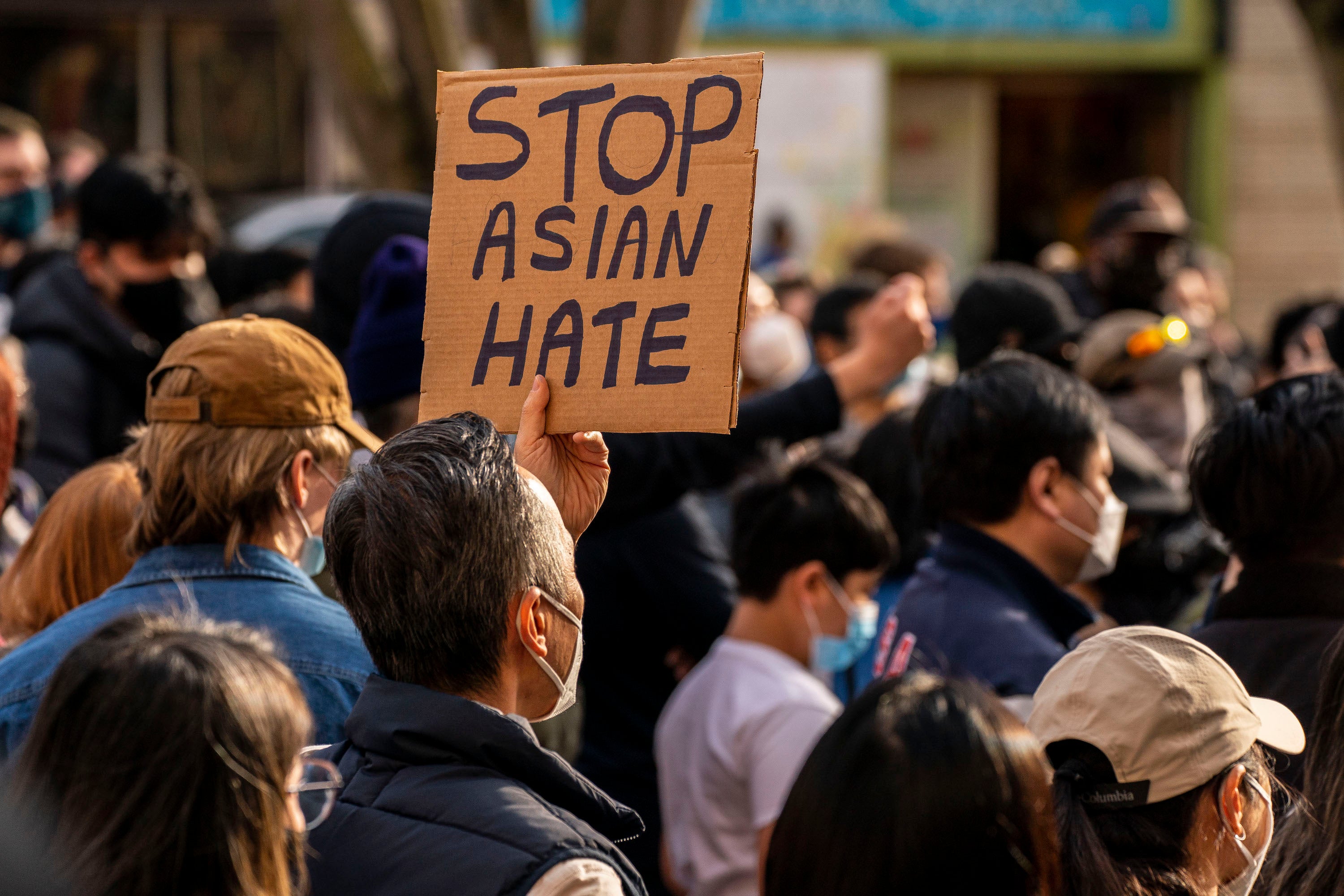 Demonstrators gather in the Chinatown-International District for a "We Are Not Silent" rally and march against anti-Asian hate and bias in Seattle, Washington.