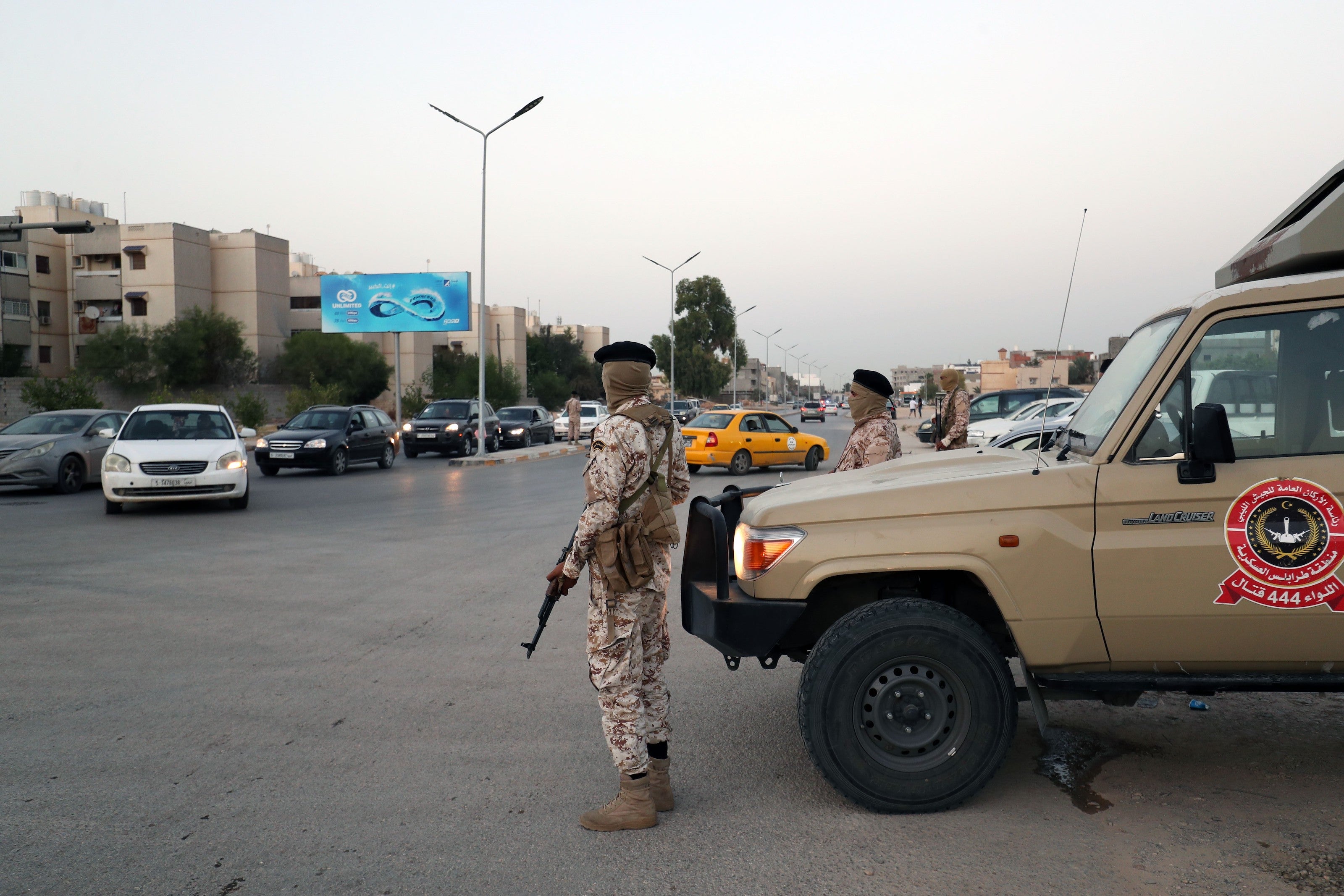 Members of Brigade 444, an armed group linked with the Tripoli Army Chief of Staff, patrol streets of Salaheddin in the southern suburbs of Tripoli.