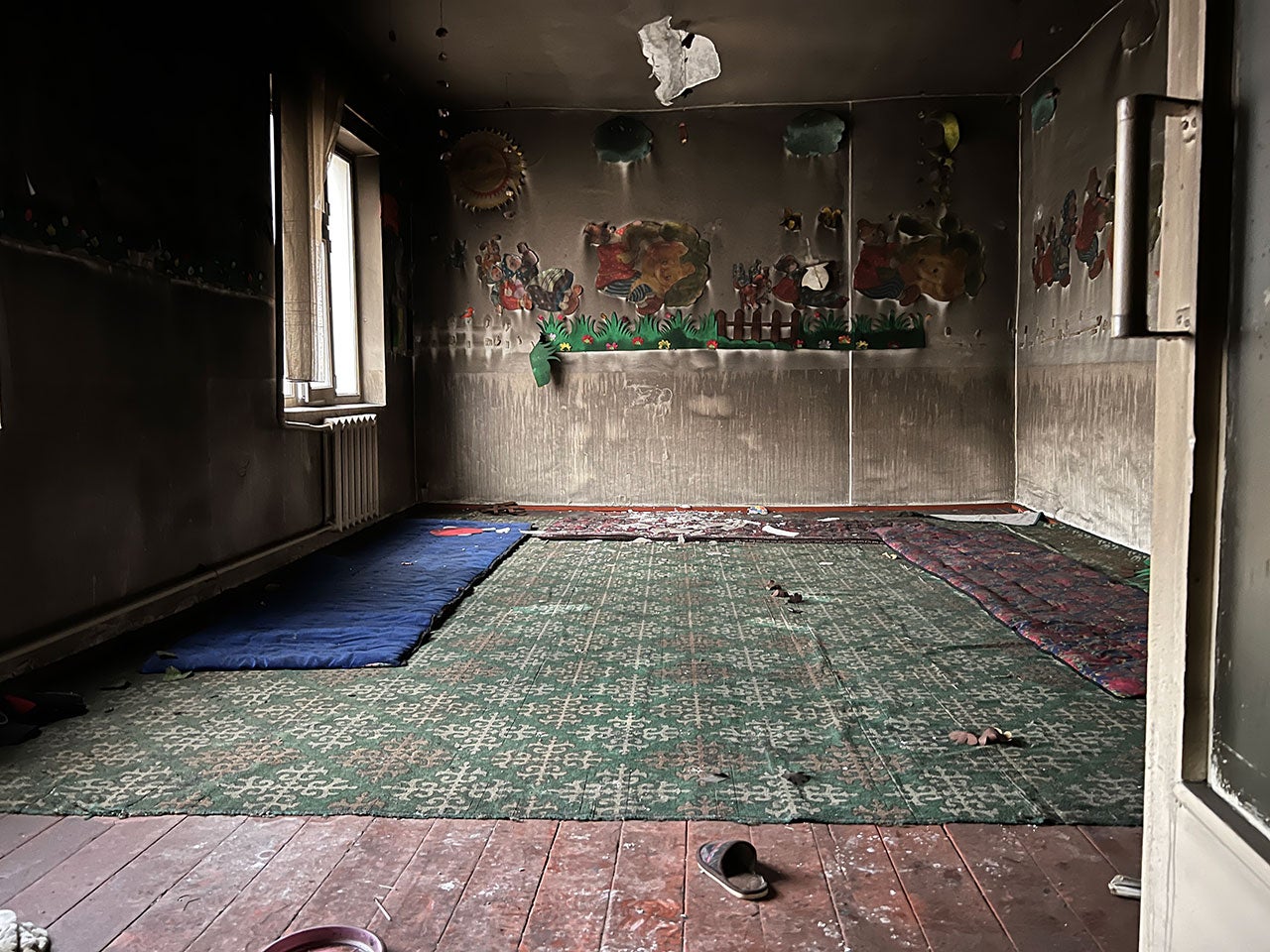 A burnt-out kindergarten in the Kyrgyz village of Ak-Sai. The village saw widespread looting and destruction whilebriefly eunder the control of  by Tajik forces on September 16, 2022.