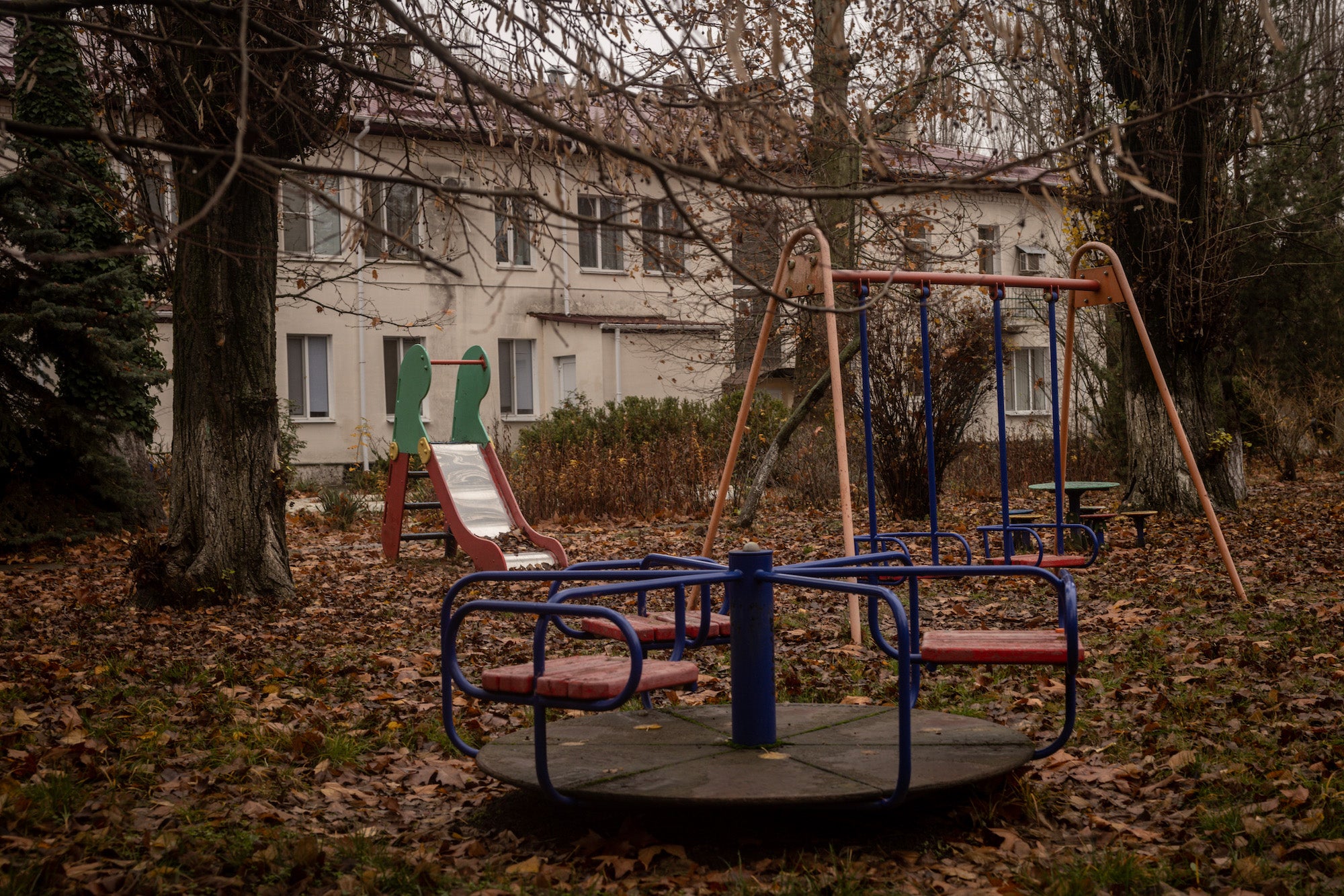 The overgrown playground of a residential institution for children in Kherson, Ukraine, where Russian forces allegedly took 46 children from, as seen on November 27, 2022.