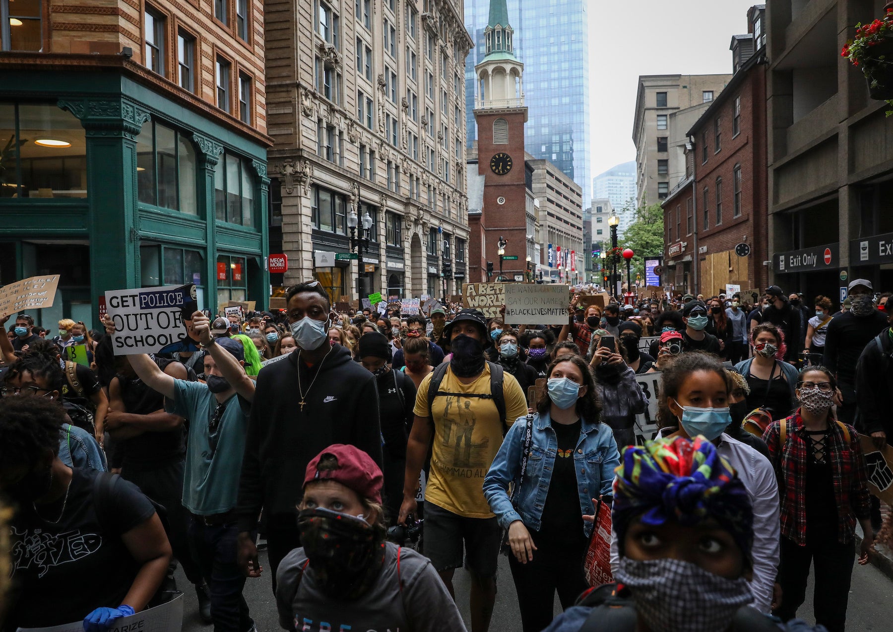 Hundreds march from Nubian Square to City Hall to urge Boston City Council to reallocate Boston police funding to youth jobs programs in Boston Public Schools in Boston, Massachusetts, US.