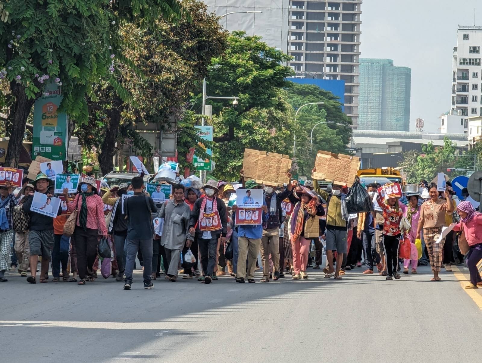 Coalition of Cambodian Farmer Community (CCFC) supporters march to the Ministry of Interior in Phnom Penh on May 22, 2023, to demand the release of three of their members charged with plotting and incitement. 