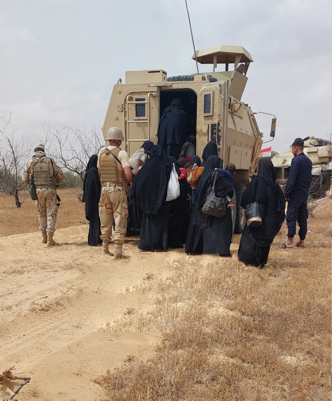 A photo published by a pro-army militia Facebook page, Uswod Al-karama, (which was later deleted) showing a group of women and children, whom the group described as the wives and children of men of the Islamic State affiliate, being arrested by the Egyptian army near al-Moqat’a area south of Sheikh Zuwayed in North Sinai, Egypt.