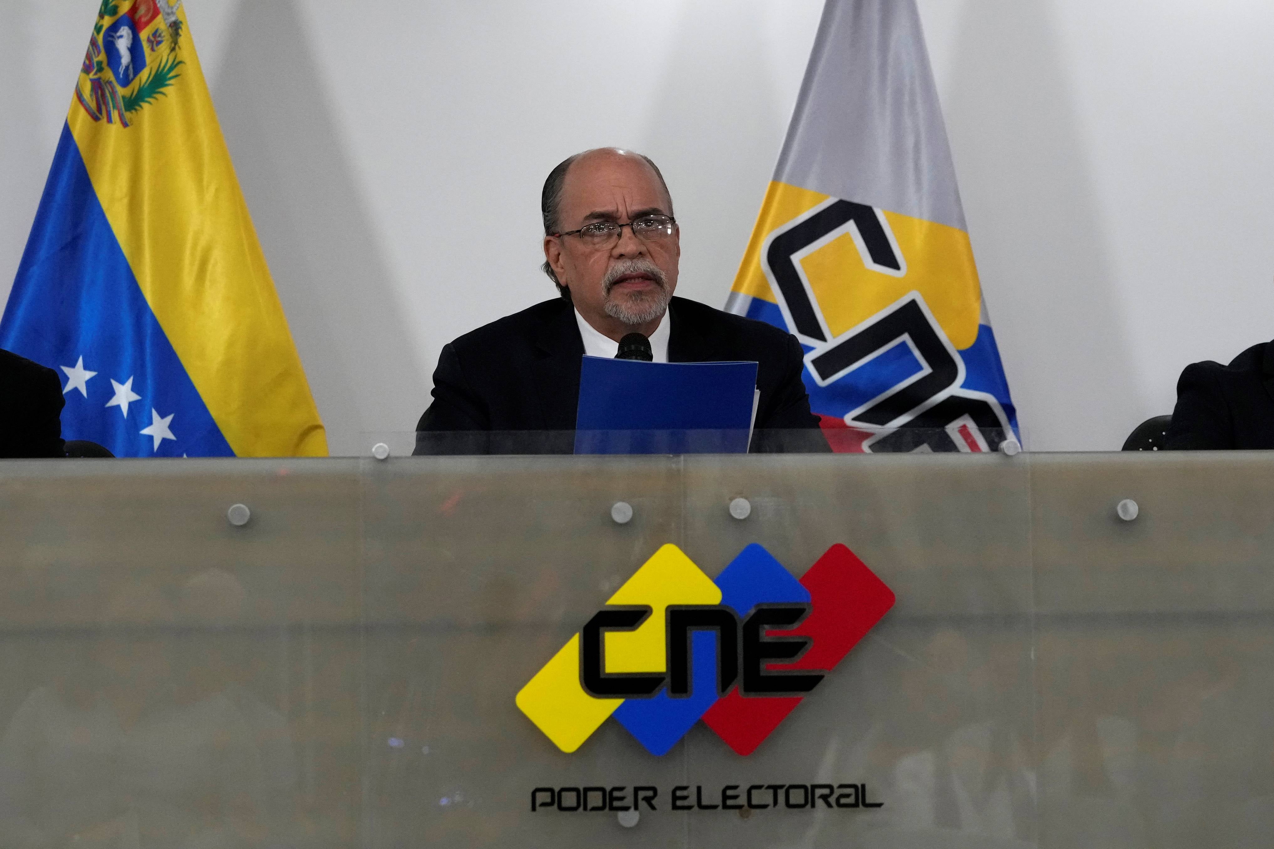 Pedro Enrique Calzadilla, president of the National Electoral Council (CNE), center, announces the resignation of the council's five board members at the CNE in Caracas, Venezuela, Thursday, June 15, 2023.