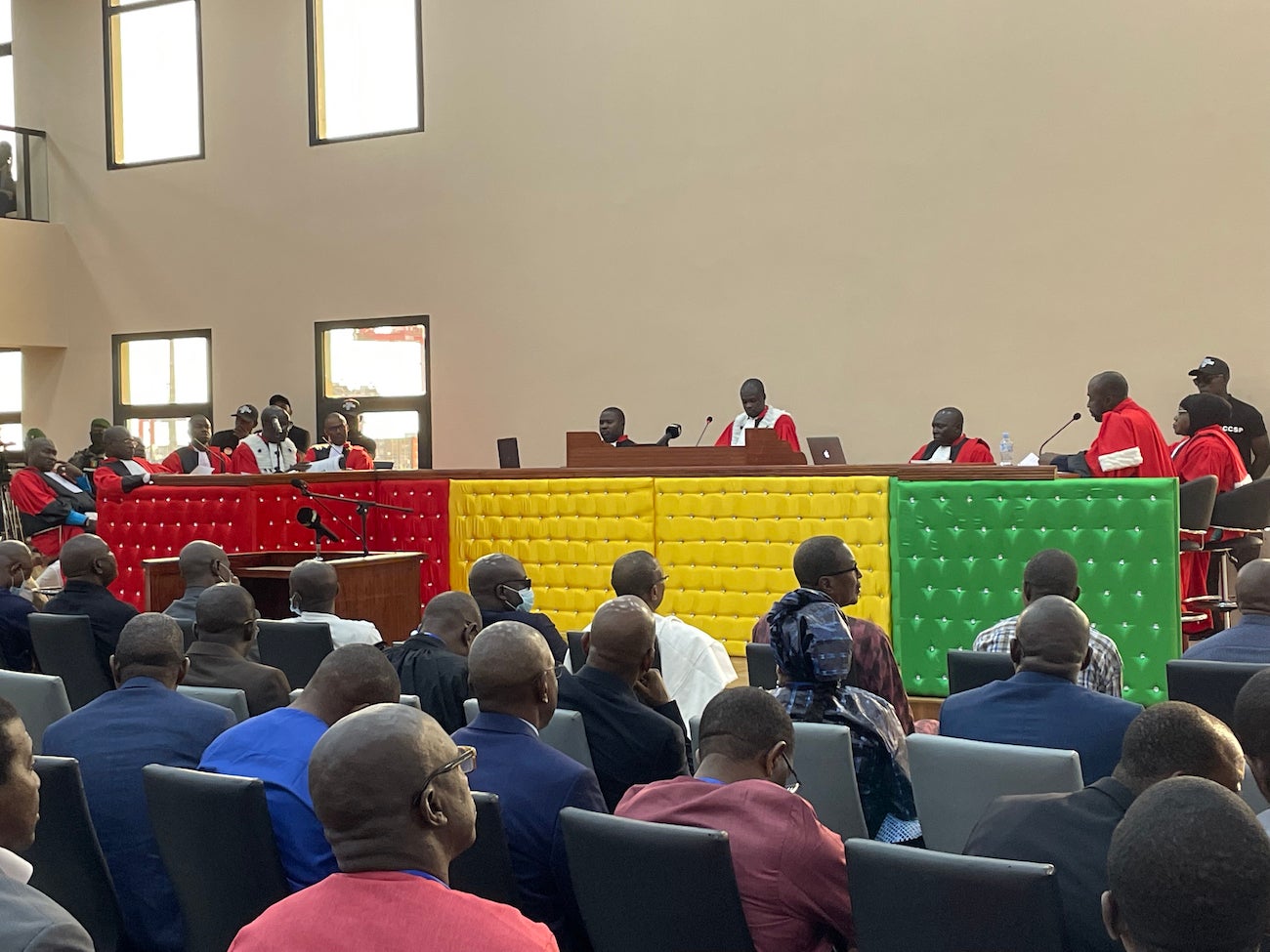 Defendants in Guinea’s 2009 stadium massacre trial appear before the judges on the first day of the trial, in Conakry, September 28, 2022. 