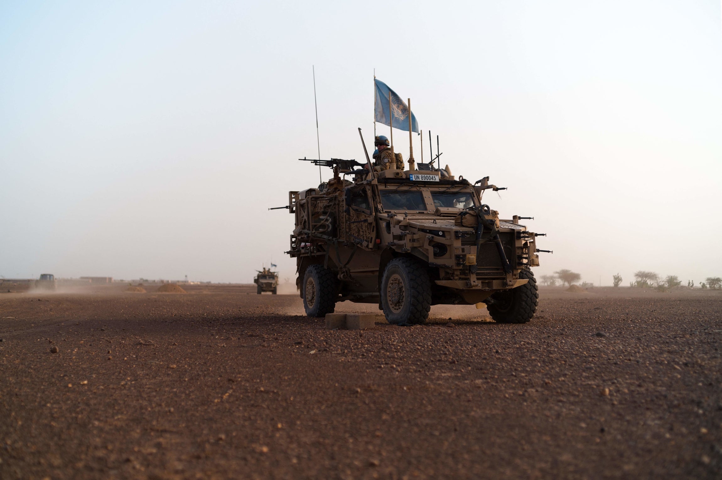 Vehicles from the United Nations Multidimensional Integrated Stabilization Mission in Mali (MINUSMA) Long Range Reconnaissance Group (LRRG) in the vicinity of Menaka, Mali, on October 25, 2021.