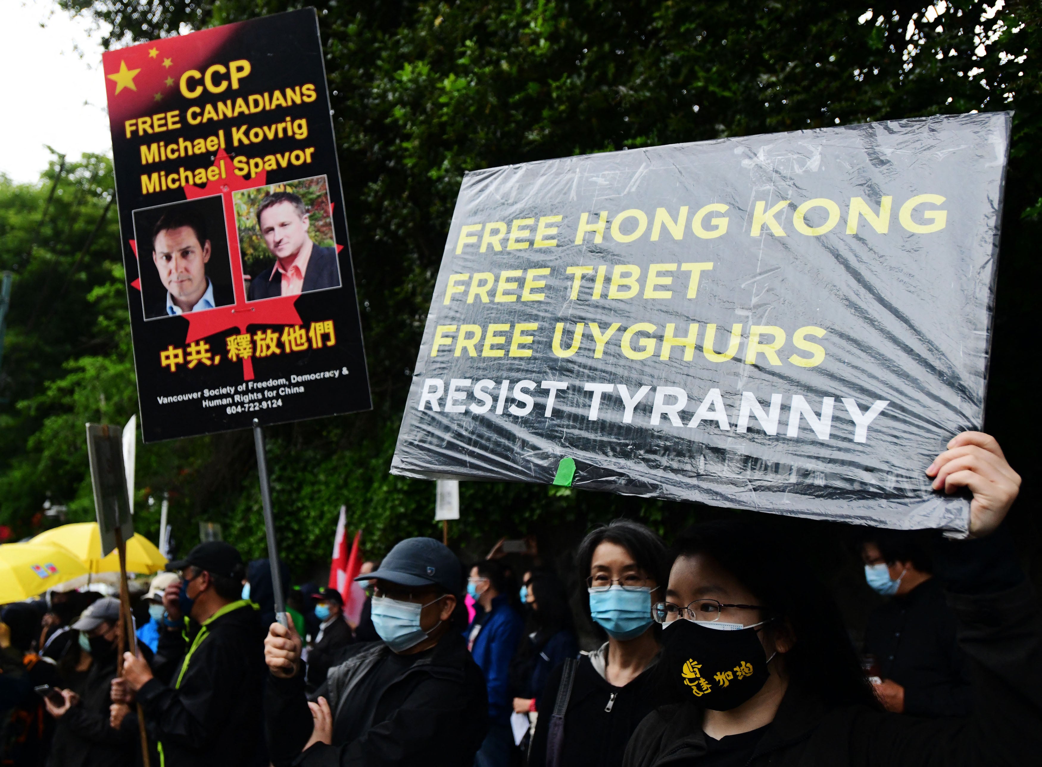 People attend a vigil commemorating the 32nd anniversary of the 1989 Tiananmen Square democracy protests and crackdown outside of the Chinese consulate in Vancouver, Canada, June 4, 2021.