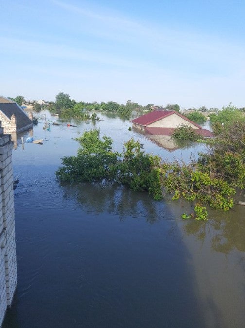 Nearly submerged houses in the flooded town of Oleshky, Ukraine, after the June 6 destruction of the Nova Kakhovka dam. Photo posted to the @kakhovkacatastrophe Telegram channel on June 13, 2023. 