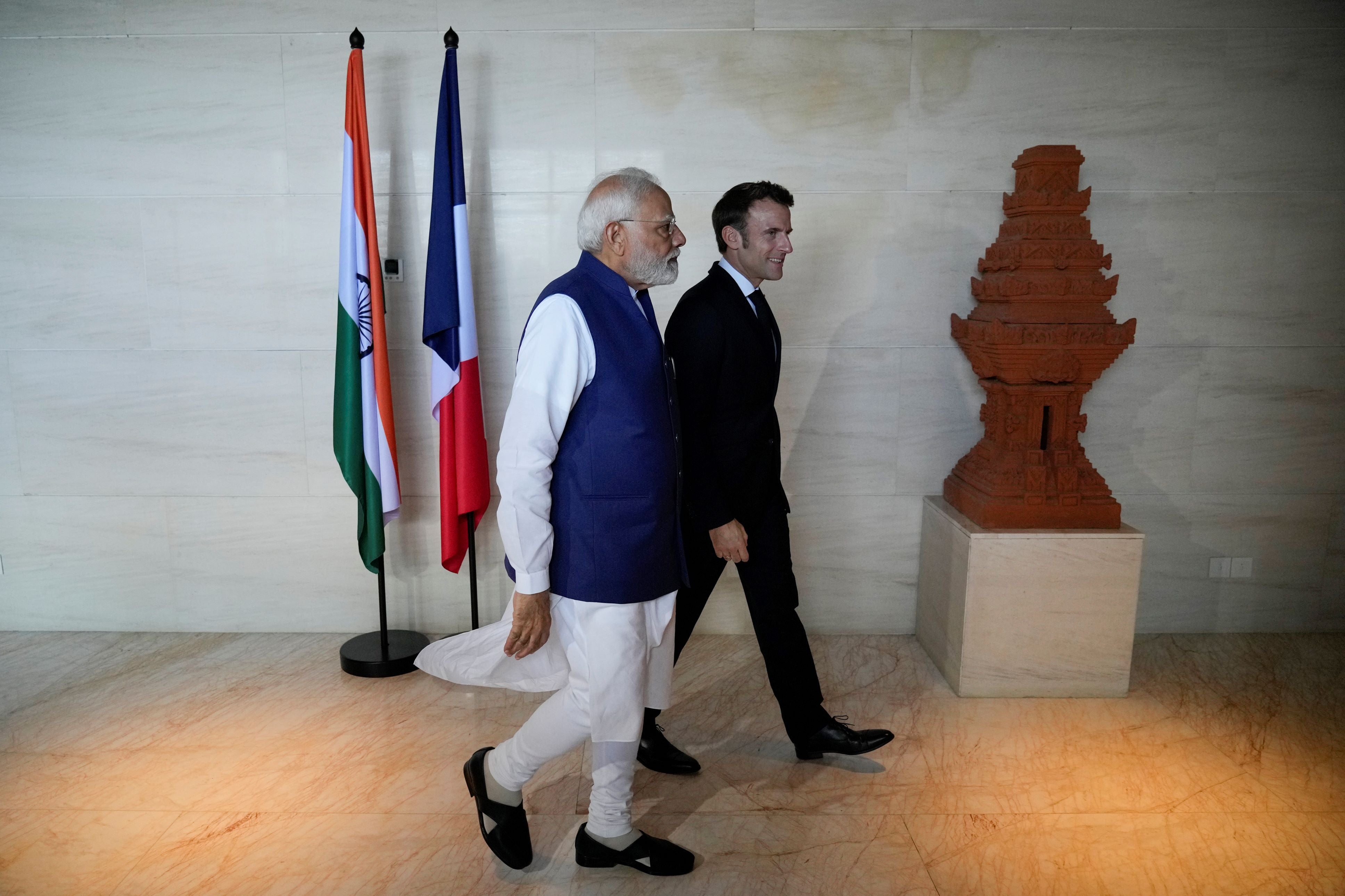 India Prime Minister Narendra Modi, left, and French President Emmanuel Macron at a bilateral meeting on the sidelines of the G20 Summit in Nusa Dua, Bali, Indonesia, on November 16, 2022