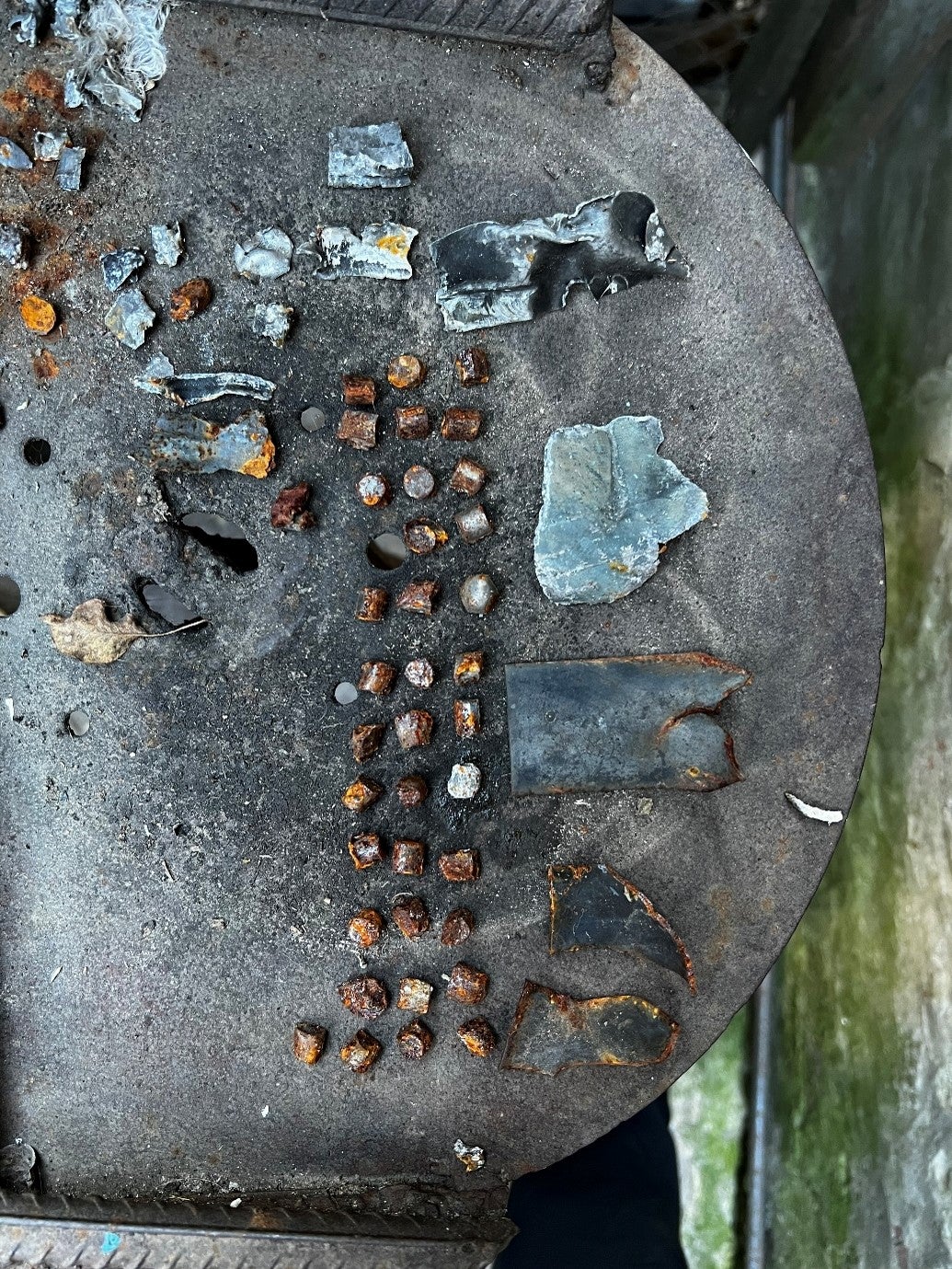 Remnants of 9N210 or 9N235 fragmentation submunitions that a family living on the right bank of the Siverskiy Donets River collected from their garden while Russian forces occupied the area in 2022.  