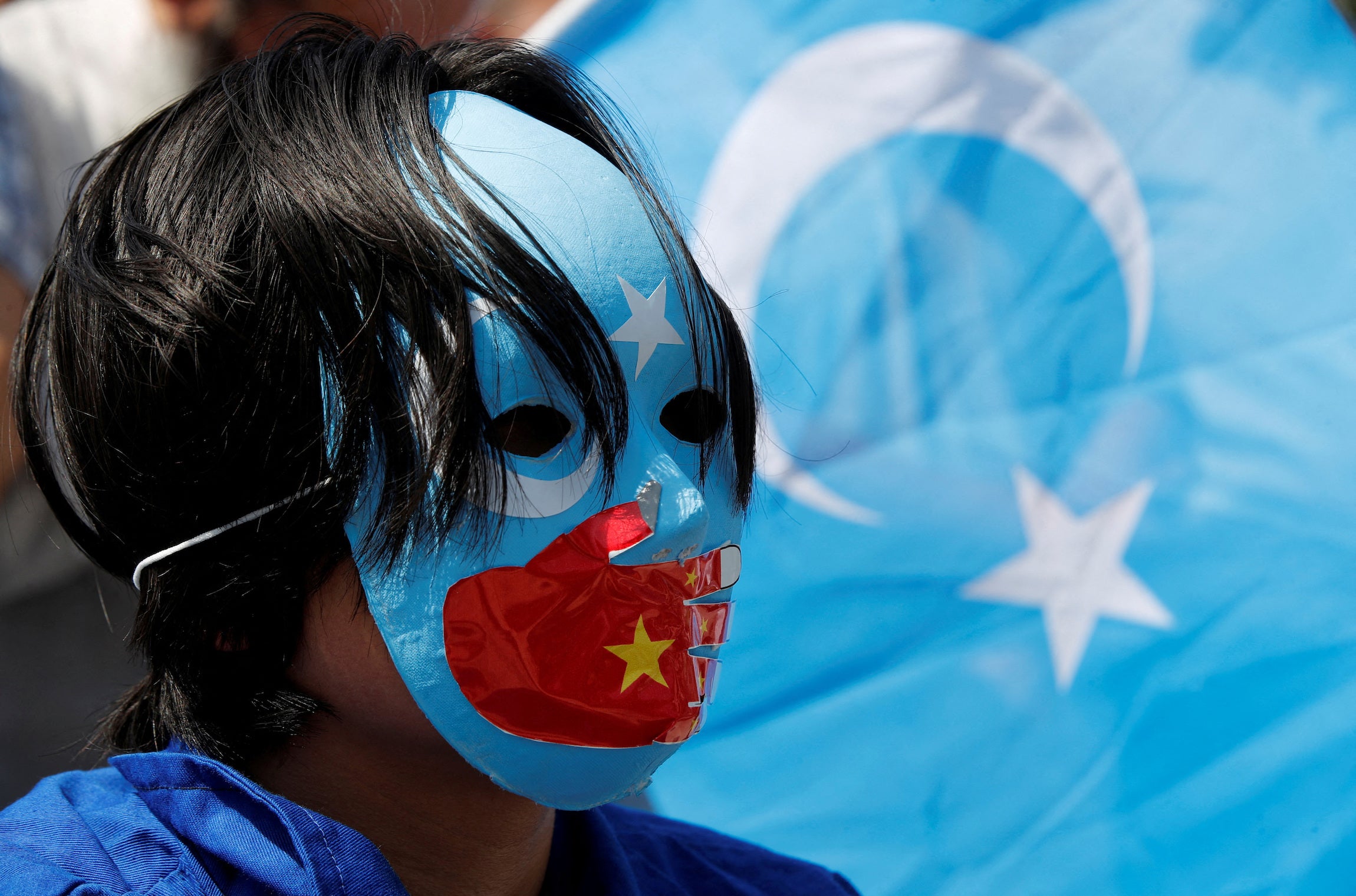 Uyghur demonstrators protest the visit of Chinese Foreign Minister Wang Yi near the Chinese consulate in Istanbul, Turkey, July 26, 2023.