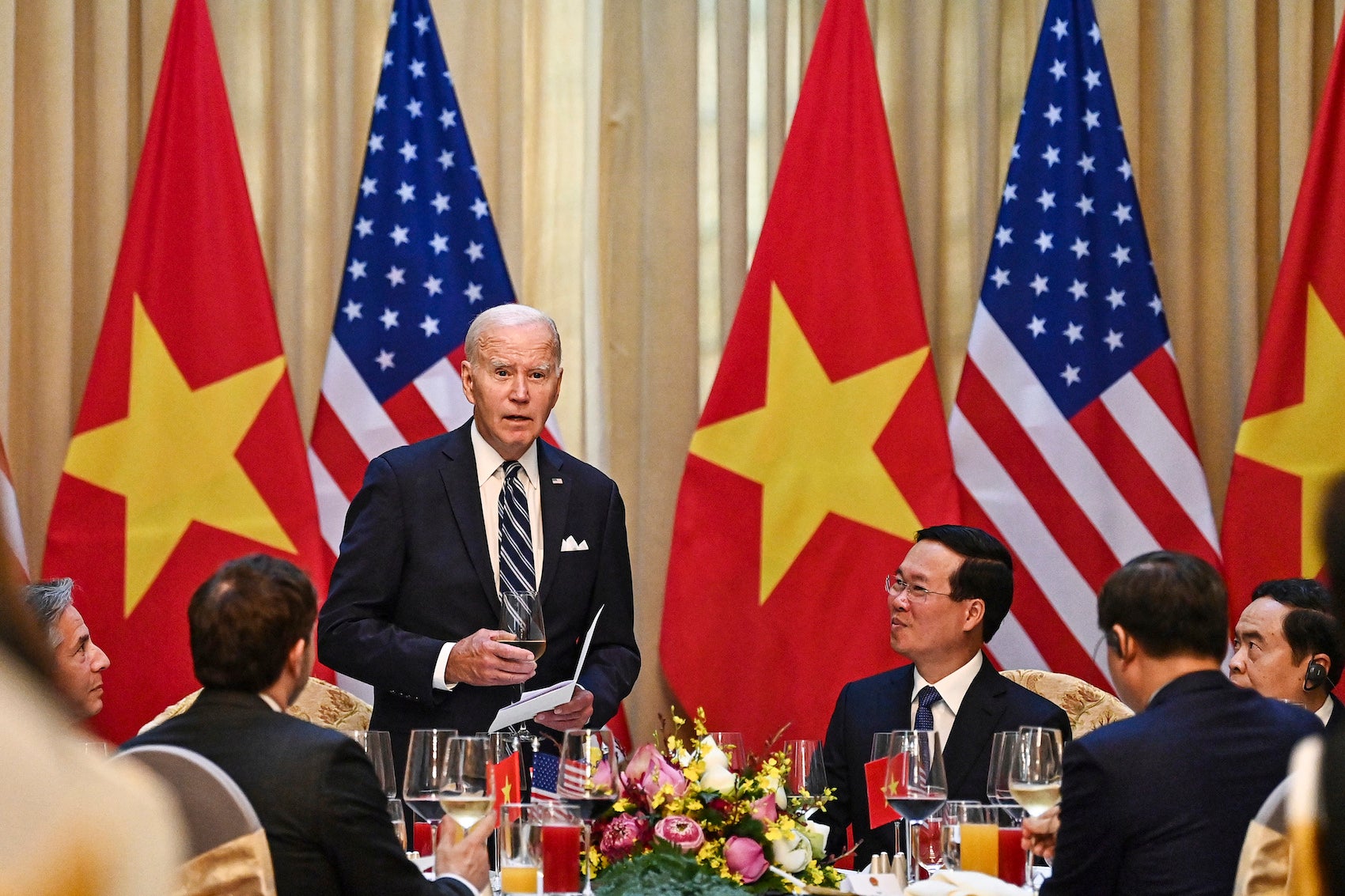 US President Joe Biden, standing, attends a state luncheon hosted by Vietnam’s President Vo Van Thuong, center right, at the Presidential Palace in Hanoi, Vietnam, September 11, 2023. 