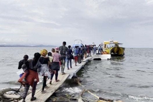 Migrants and asylum seekers embark on boats that take them from Necoclí to Capurganá, Colombia, where many began a days-long journey across the Darién Gap.