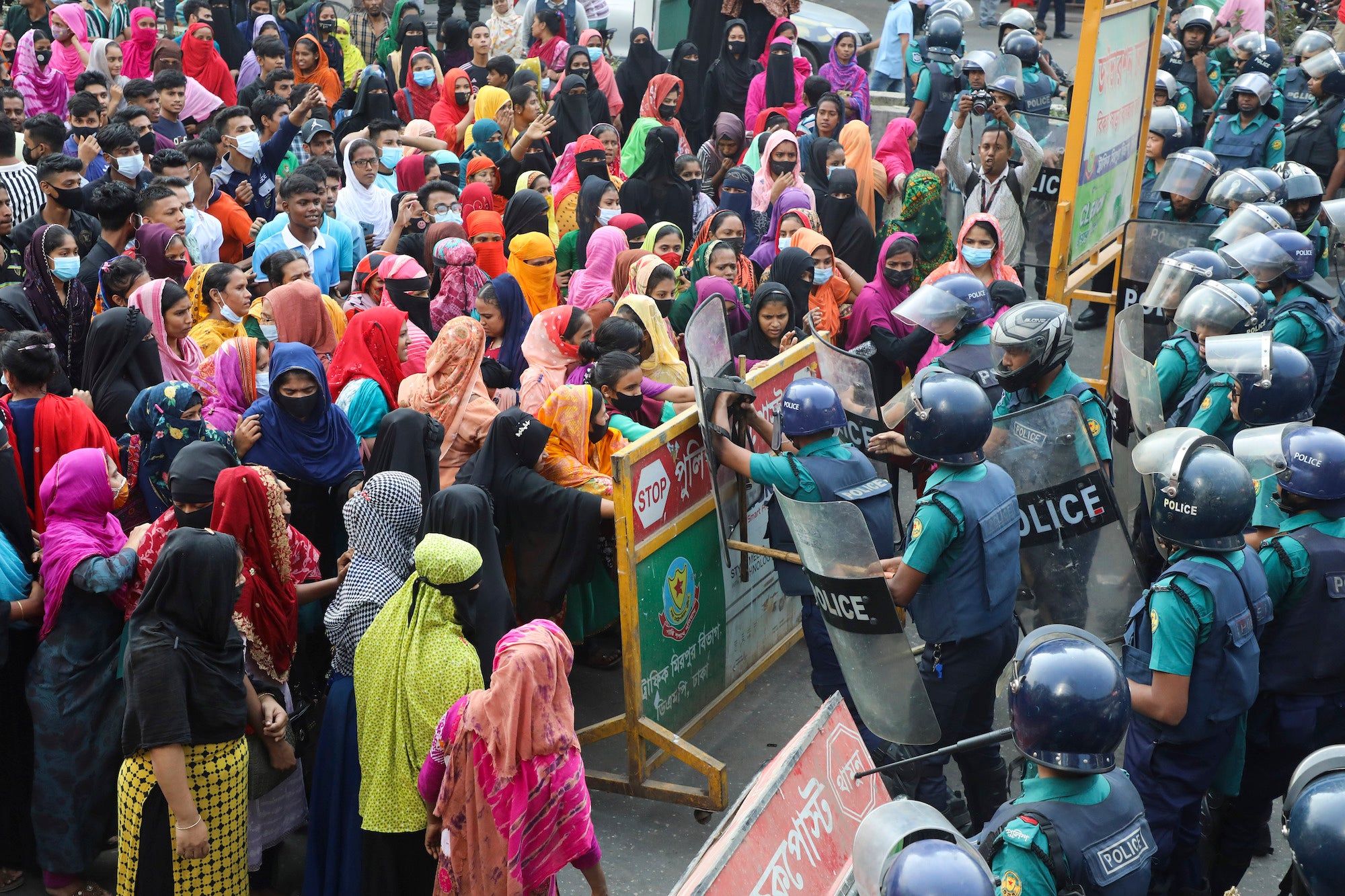 Police confront garment industry workers on the streets as they protest for a wage increase, Mirpur, Dhaka, Bangladesh, November 12, 2023.