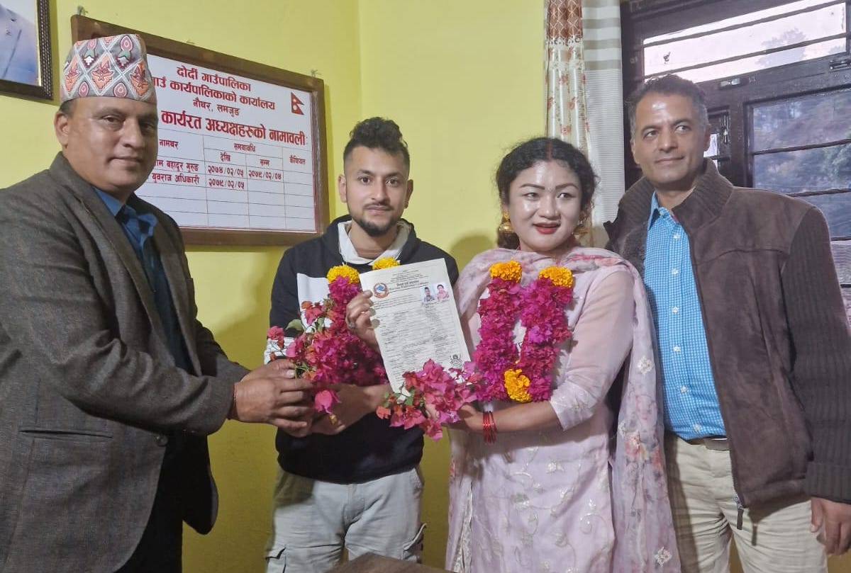 Surendra Pandey and Maya Gurung register their marriage with authorities in Dordi, a municipality in the bride’s home district of Lamjung, Nepal, November 29, 2023.