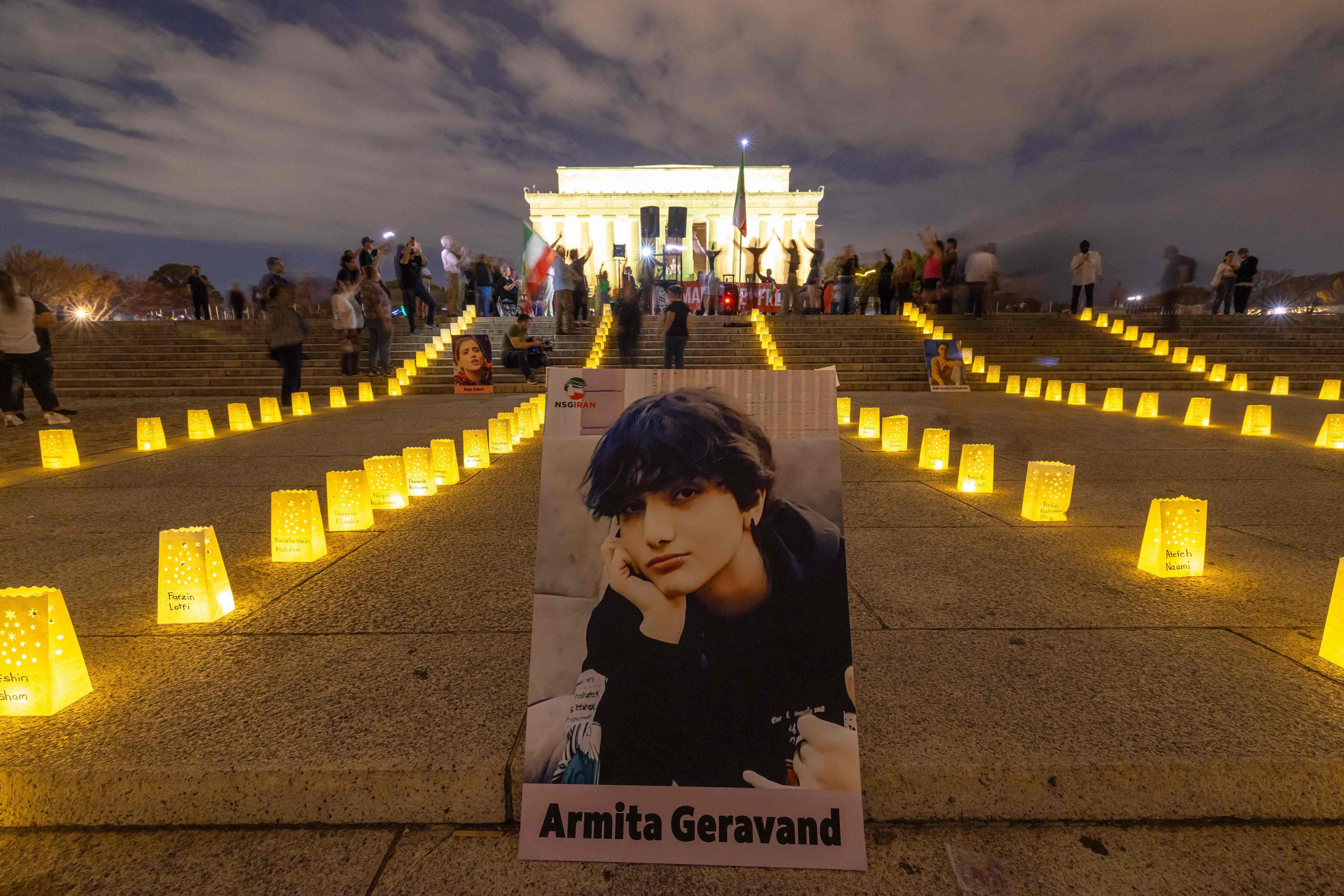 A photo of Armita Geravand,  a 16-year-old Iranian student who died after falling into a coma following an encounter with authorities in Iran,  is displayed in front of the Lincoln Memorial in Washington, DC, October 28, 2023.