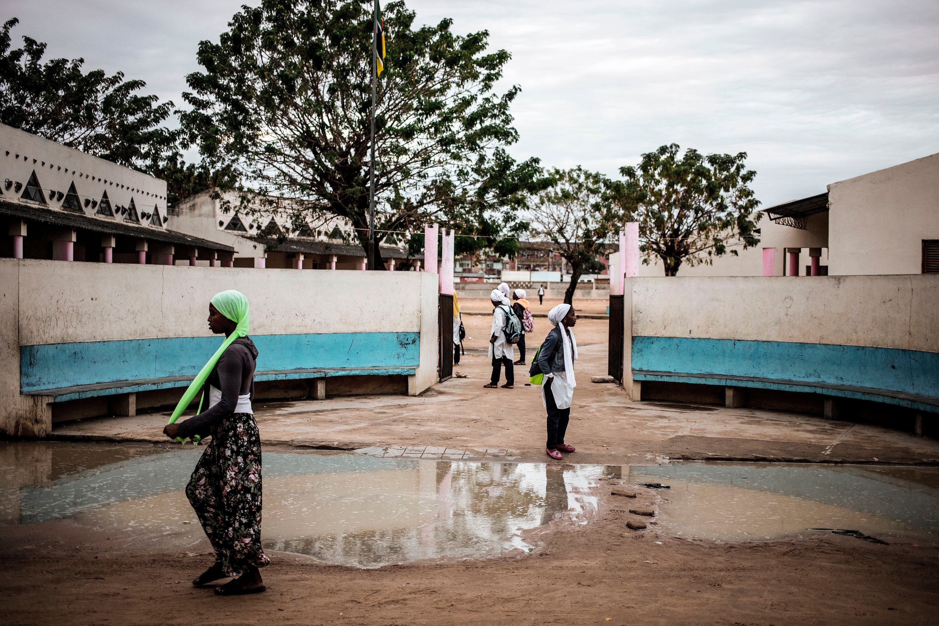 Girls in front of a school building