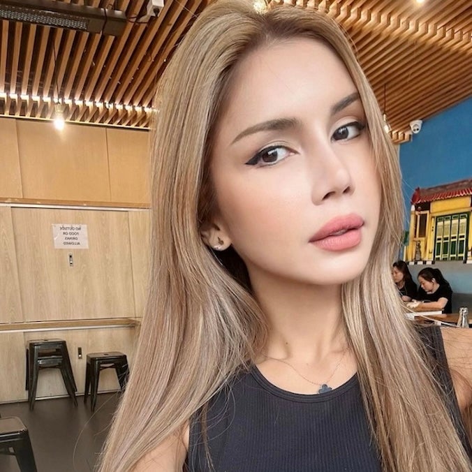 Thai police broke into Malaysian activist Nur Sajat's apartment in Bangkok in February 2021.