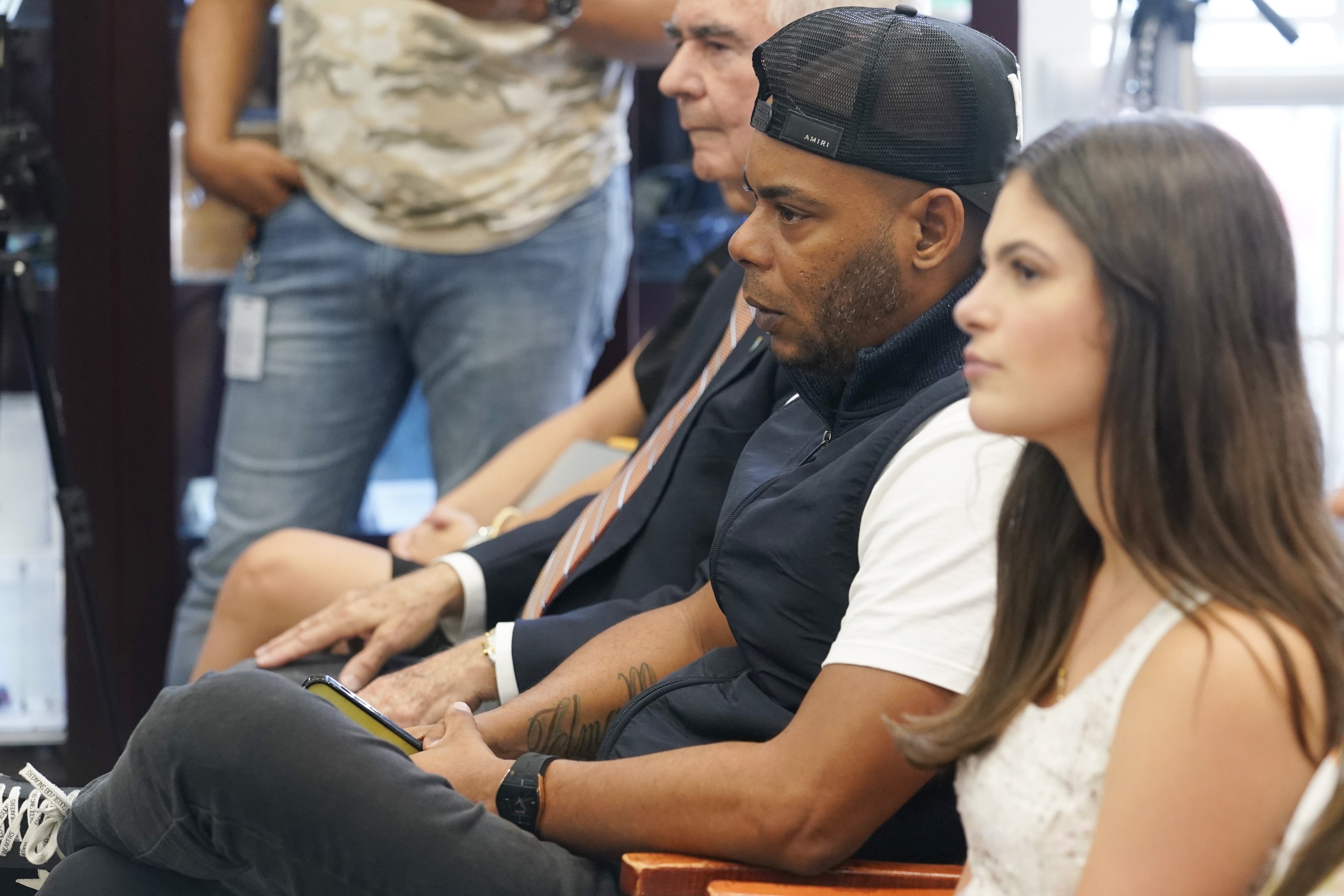 Rapper Eliecer Marquez Duany, also known as "El Funky" listens to a congressional roundtable on human right abuses in Cuba, July 10, 2023, in Hialeah Gardens, Florida, US.
