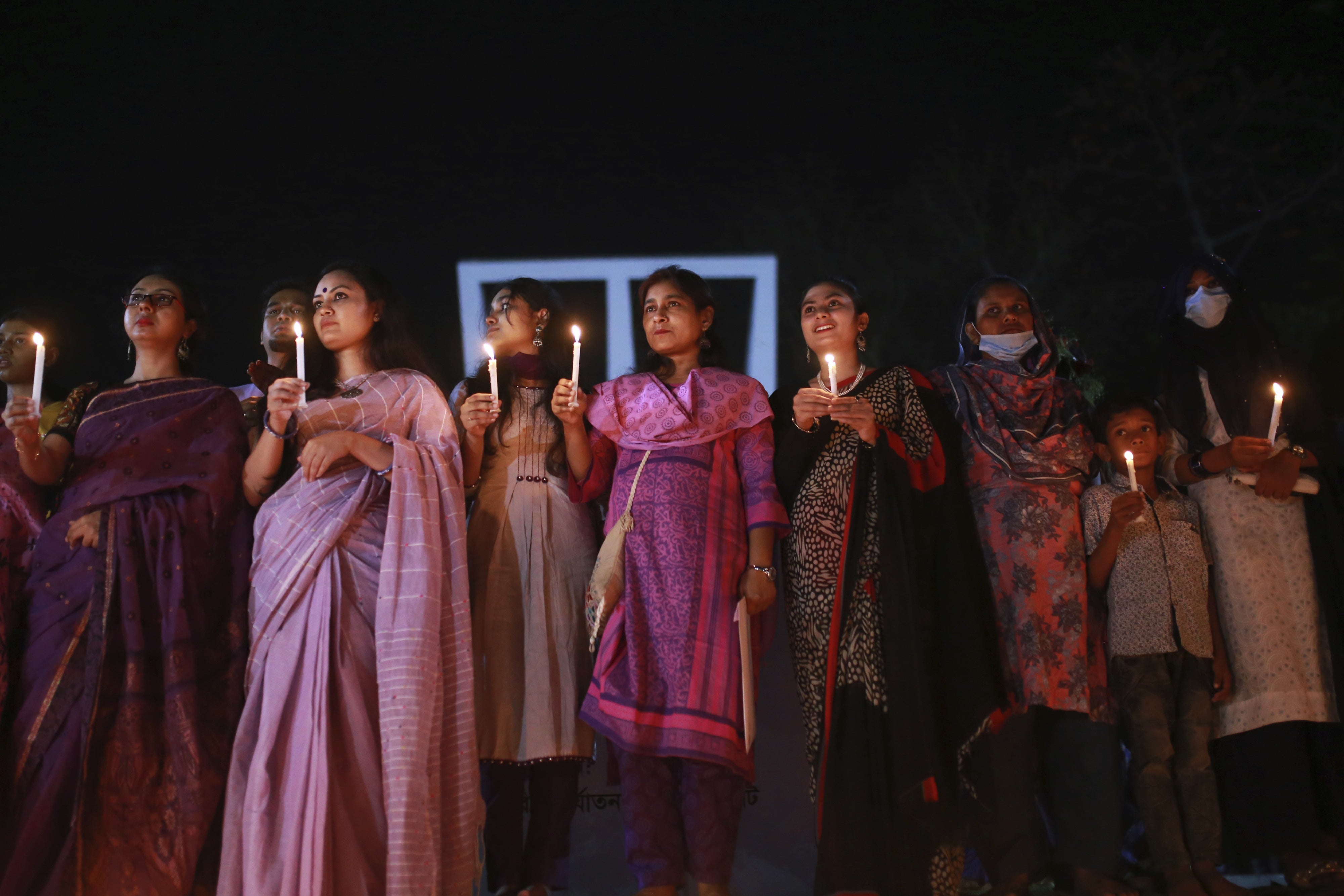 A candlelight vigil marks International Women's Day in Dhaka, Bangladesh, on March 8, 2021. 