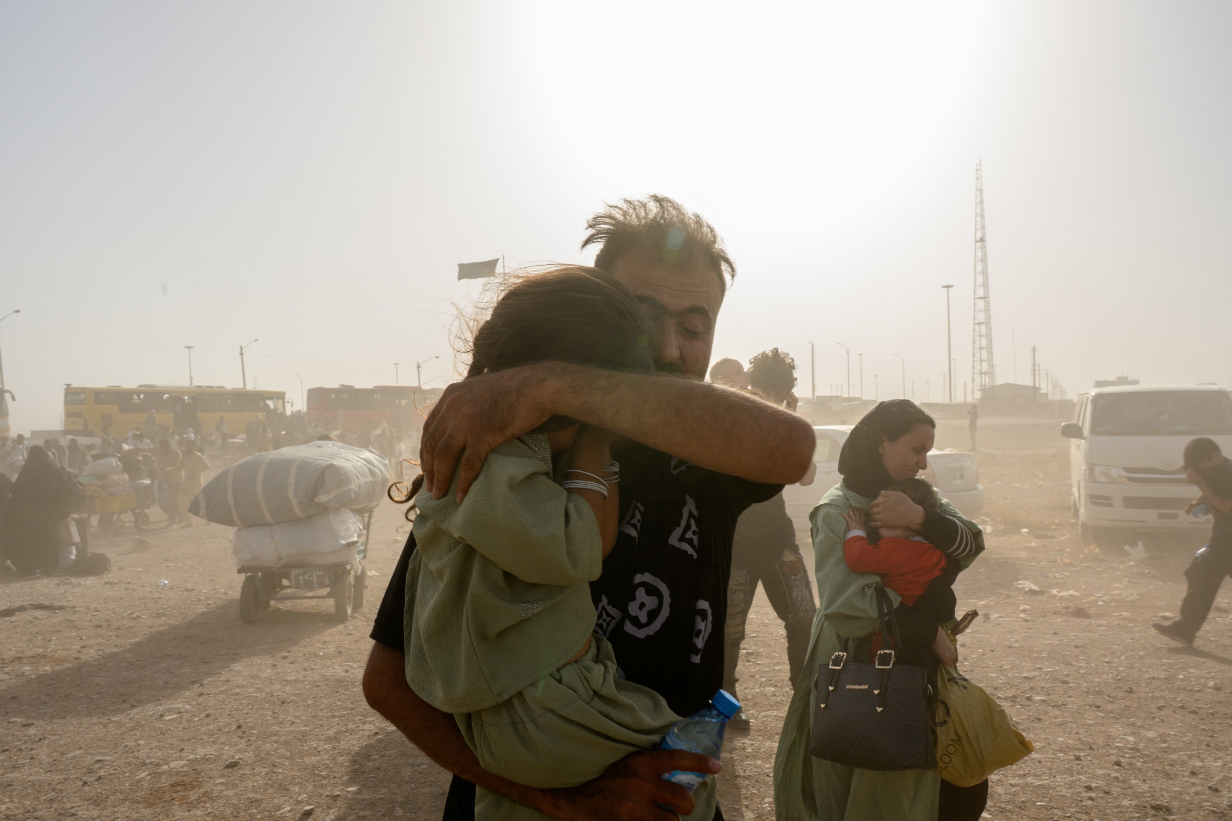 Afghan returnees cross the border from Iran, on July 3, 2025, in Islam Qala, Afghanistan. 
