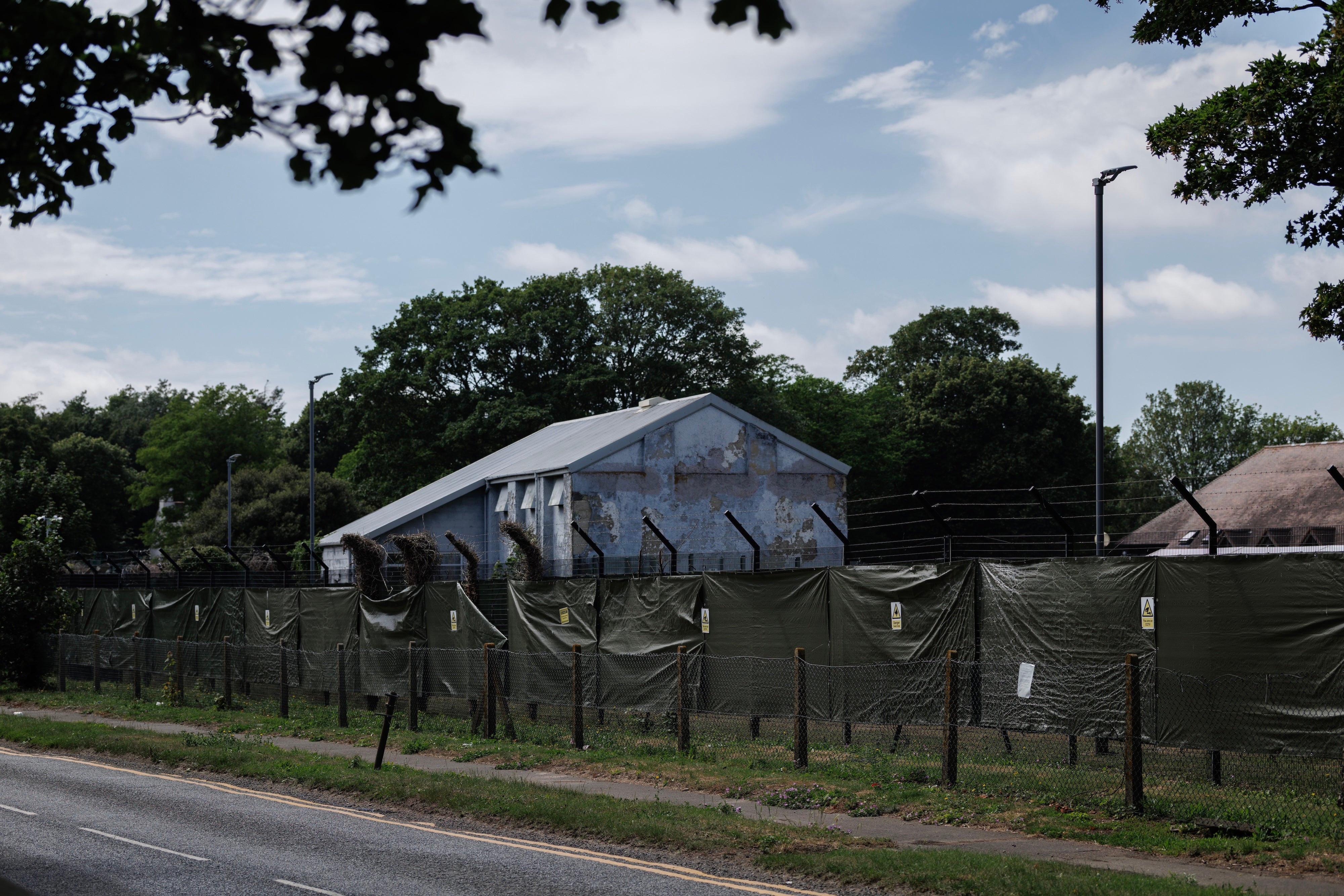 Manston Detention Centre, in Kent, United Kingdom, is used by the government to detain and process people seeking asylum. In 2022 and in 2024, the government allegedly detained unaccompanied refugee children there by purposefully misclassifying them as adults. Ramsgate, England, June 24, 2025.
