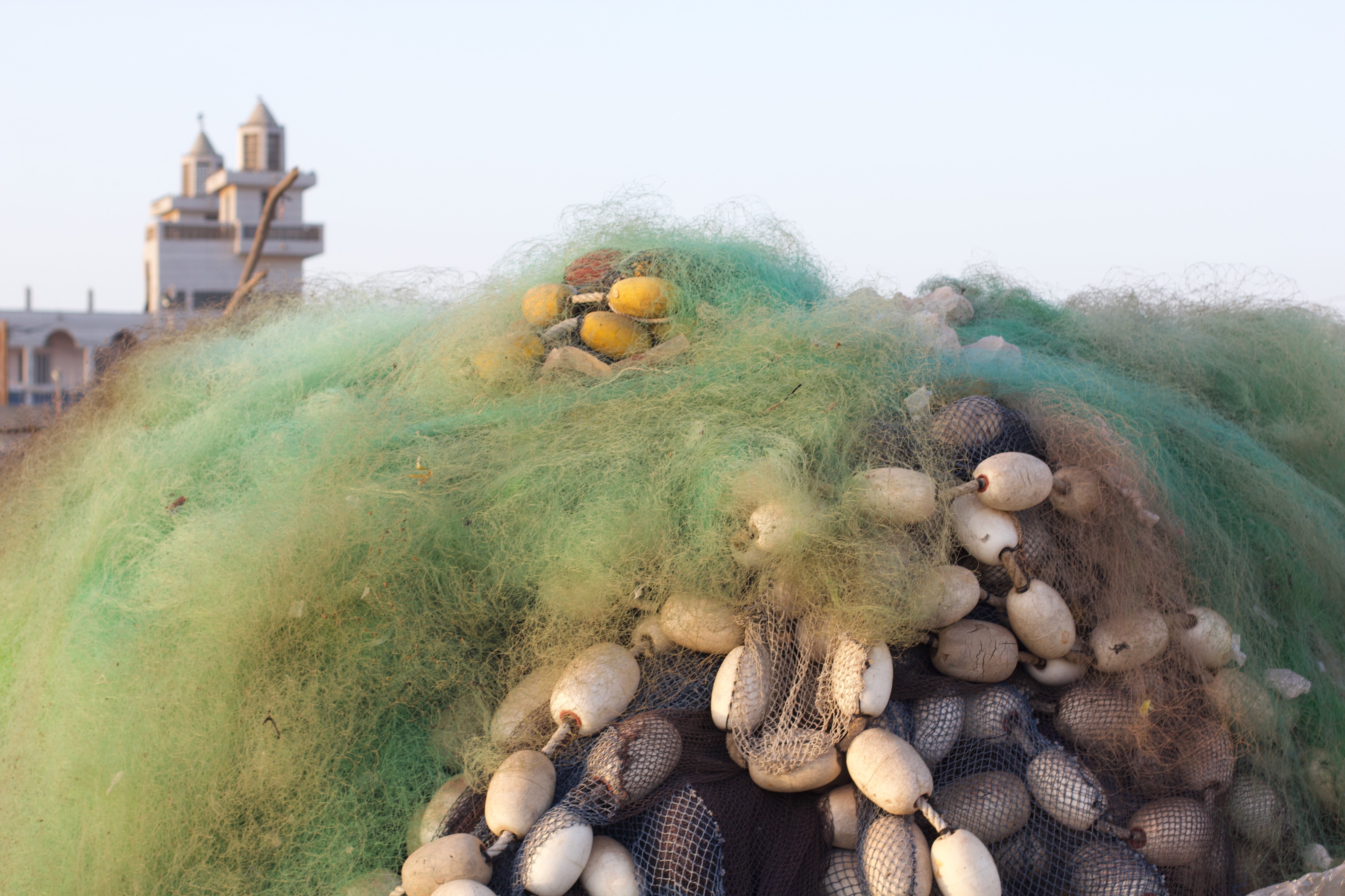 Stacked fishing nets and buoys on the Langue de Barbarie, April 2025. 