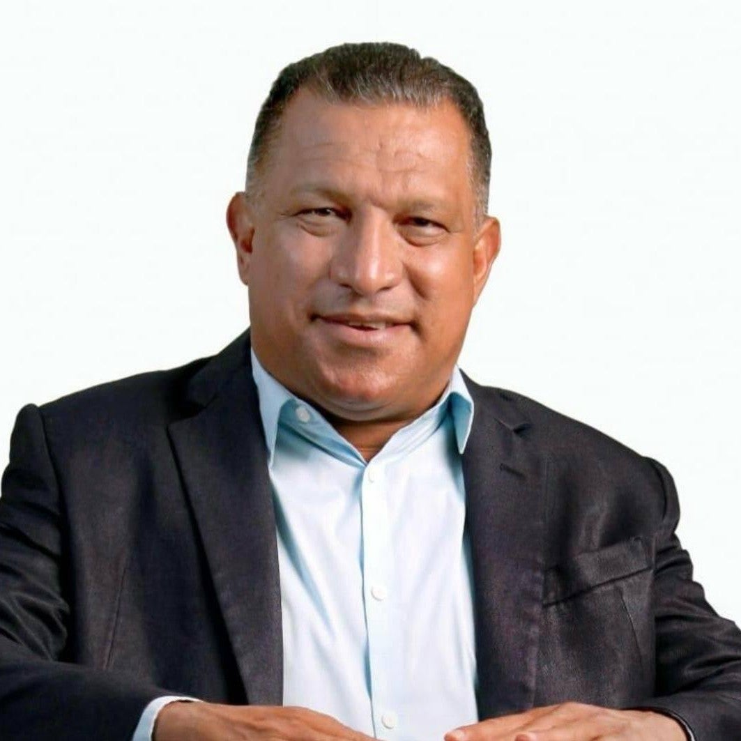 a man smiling in a photo