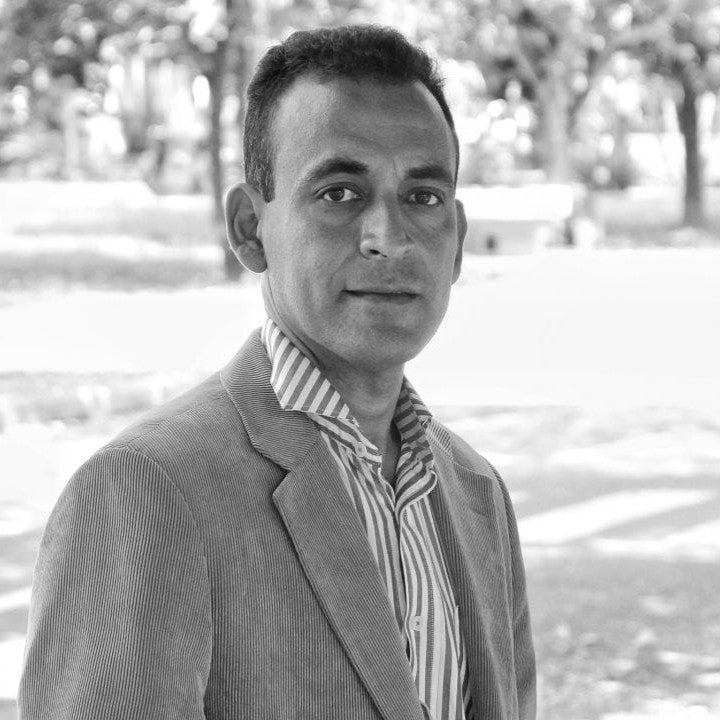 a man posing for a photo