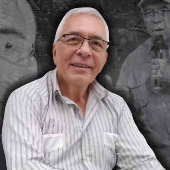 A man smiling in a photo