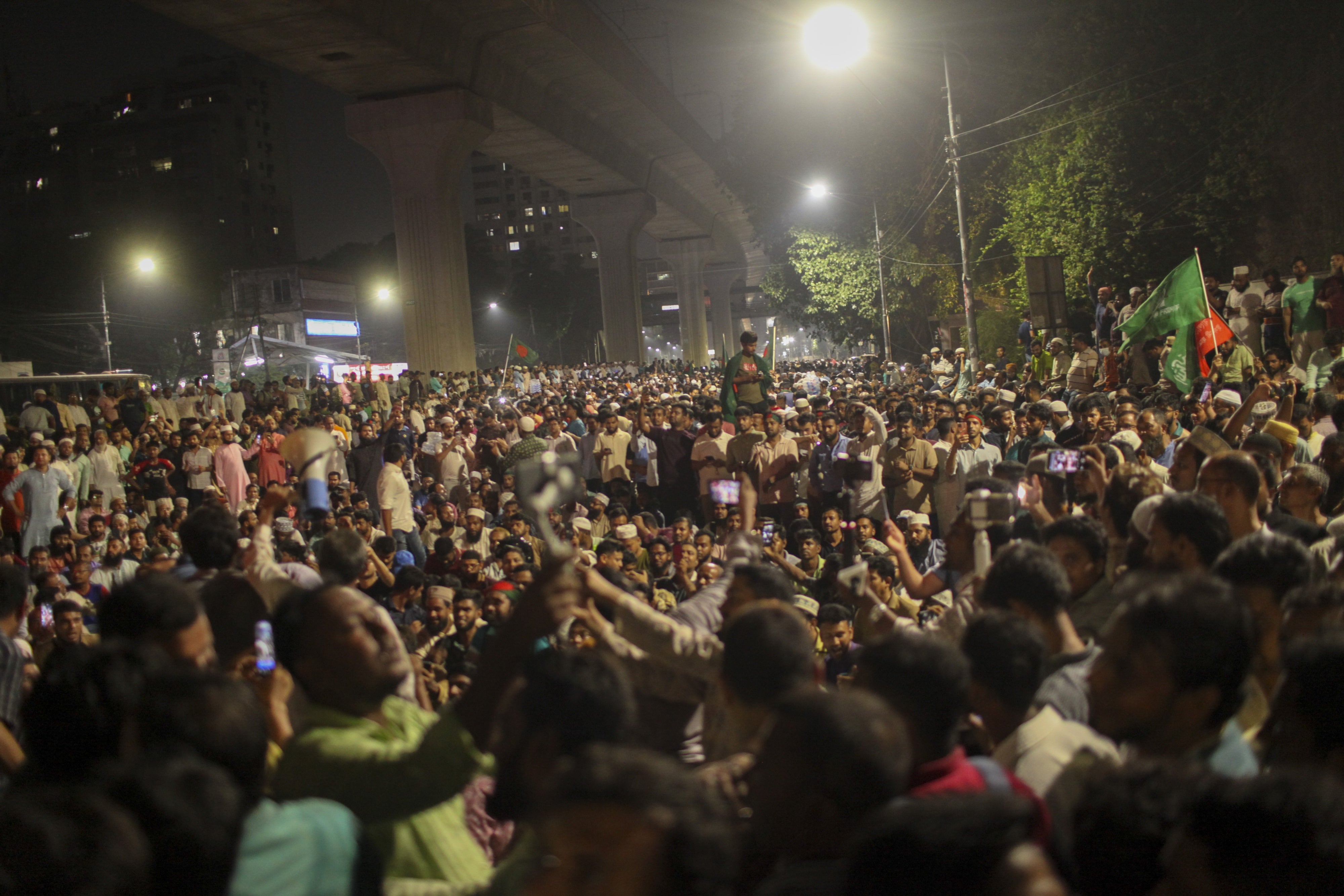 Protesters celebrate after the interim government officially bans all activities of the Awami League under the Anti-Terrorism Act, pending the conclusion of the International Crimes Tribunal  trials against the party and its leaders, in Dhaka, Bangladesh, May 10, 2025. 
