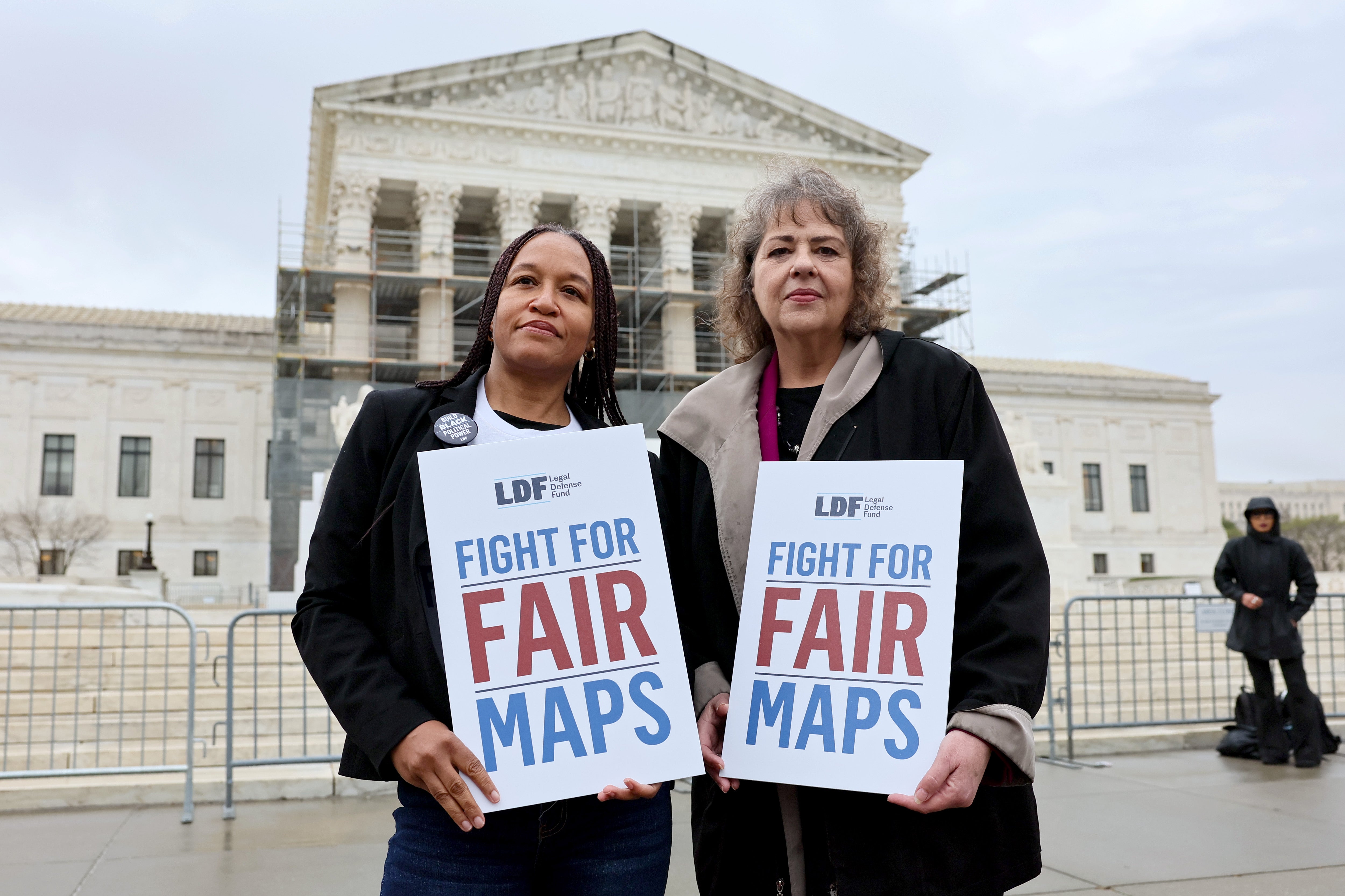 (L-R) Kesha Moore and Anne Houghtaling call on the US Supreme Court to uphold a fair and representative congressional map in Louisiana v. Callais on March 24, 2025 in Washington, DC. 