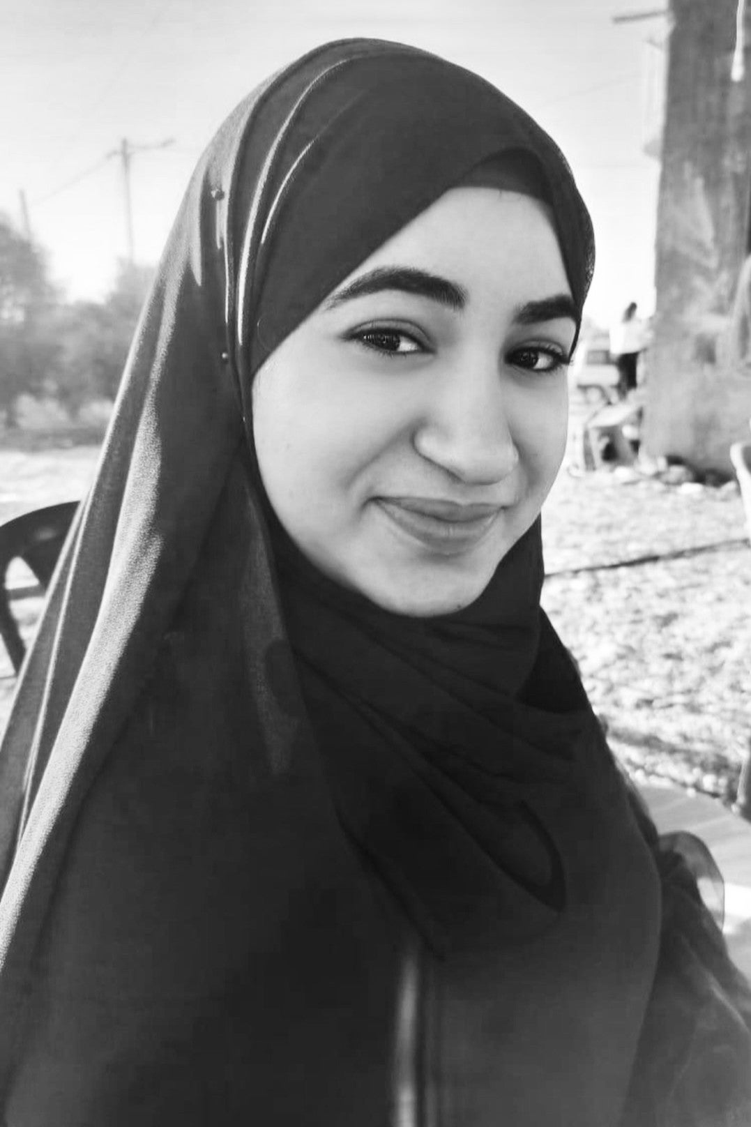 a young woman smiling in a photo