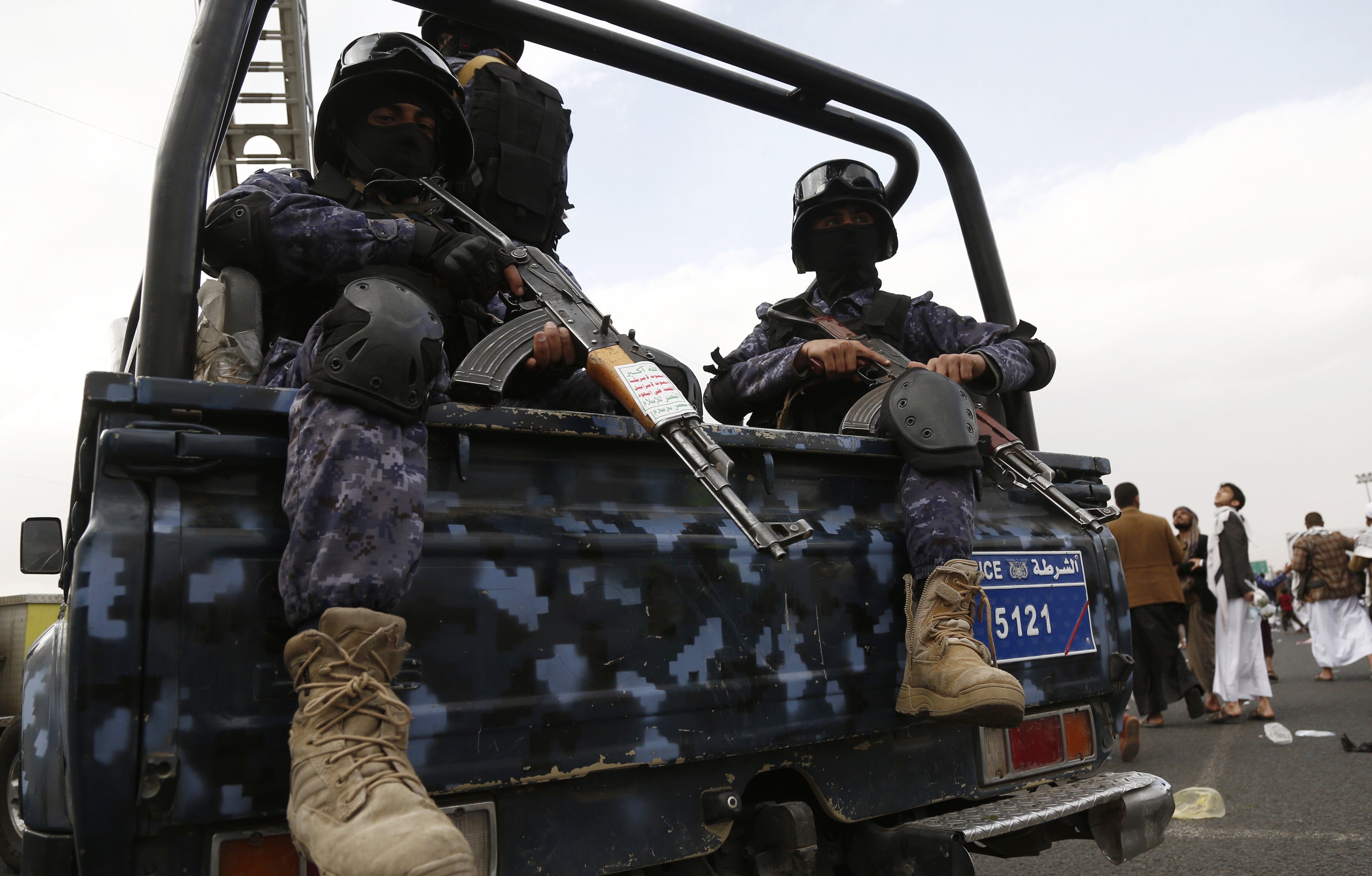 Houthi police soldiers patrol during a protest in Sana'a, Yemen, on February 16, 2024. 