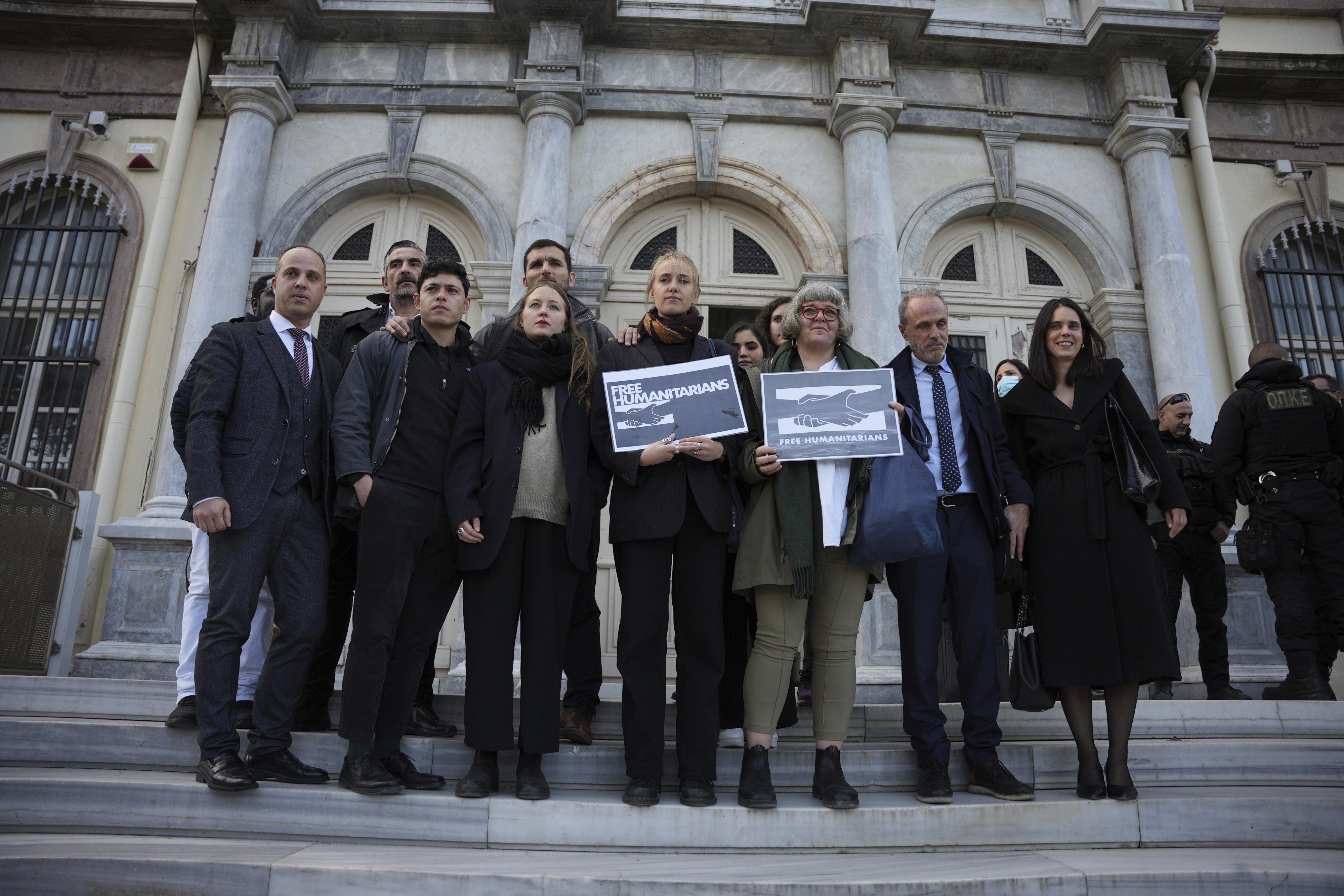 Protesters, lawyers, and aid workers outside a court in Mytilene, on the northeastern Aegean island of Lesbos, Greece, January 13, 2023.