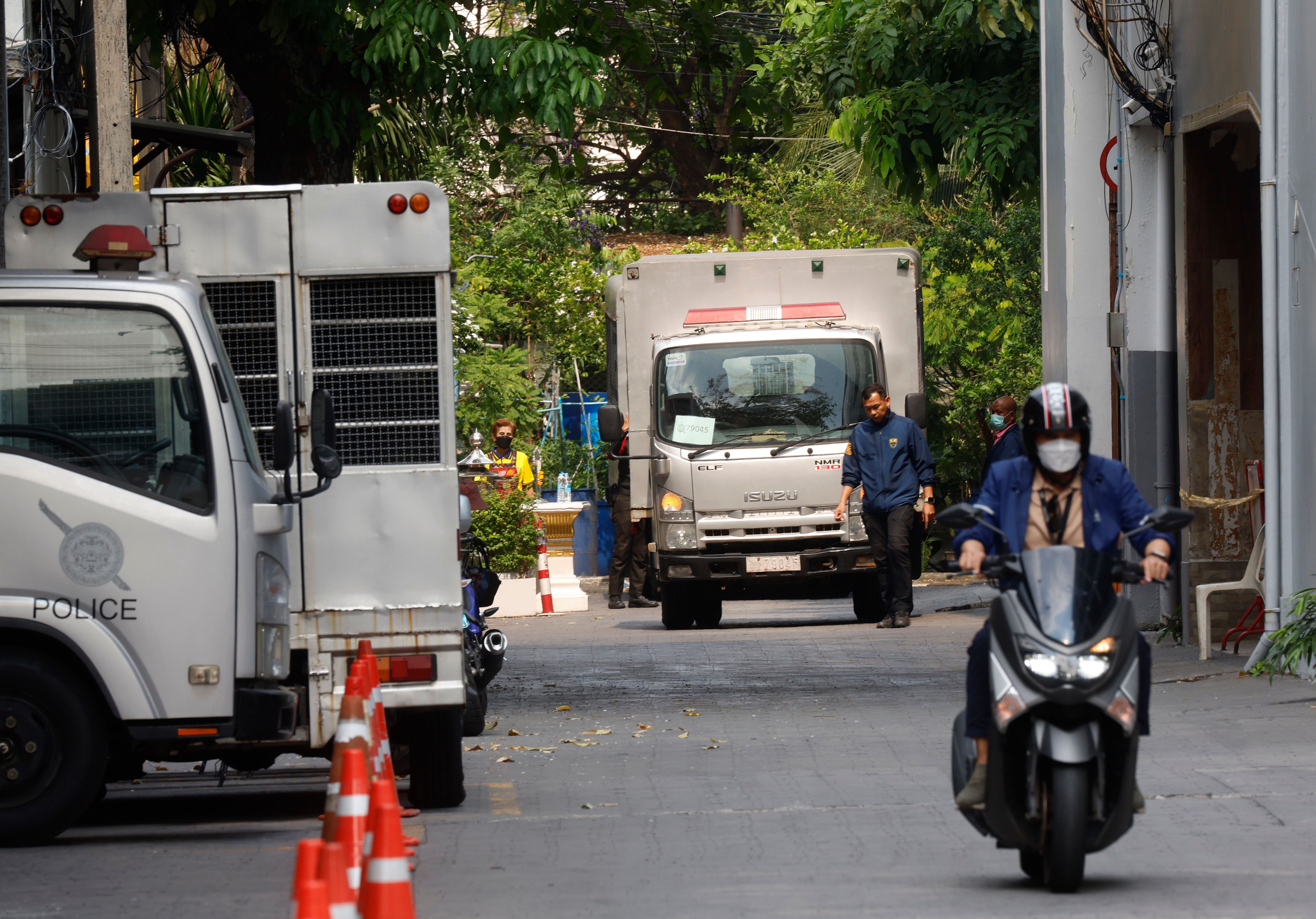 Thai officials outside the immigration detention center at the Immigration Bureau in Bangkok, February 27, 2025. 