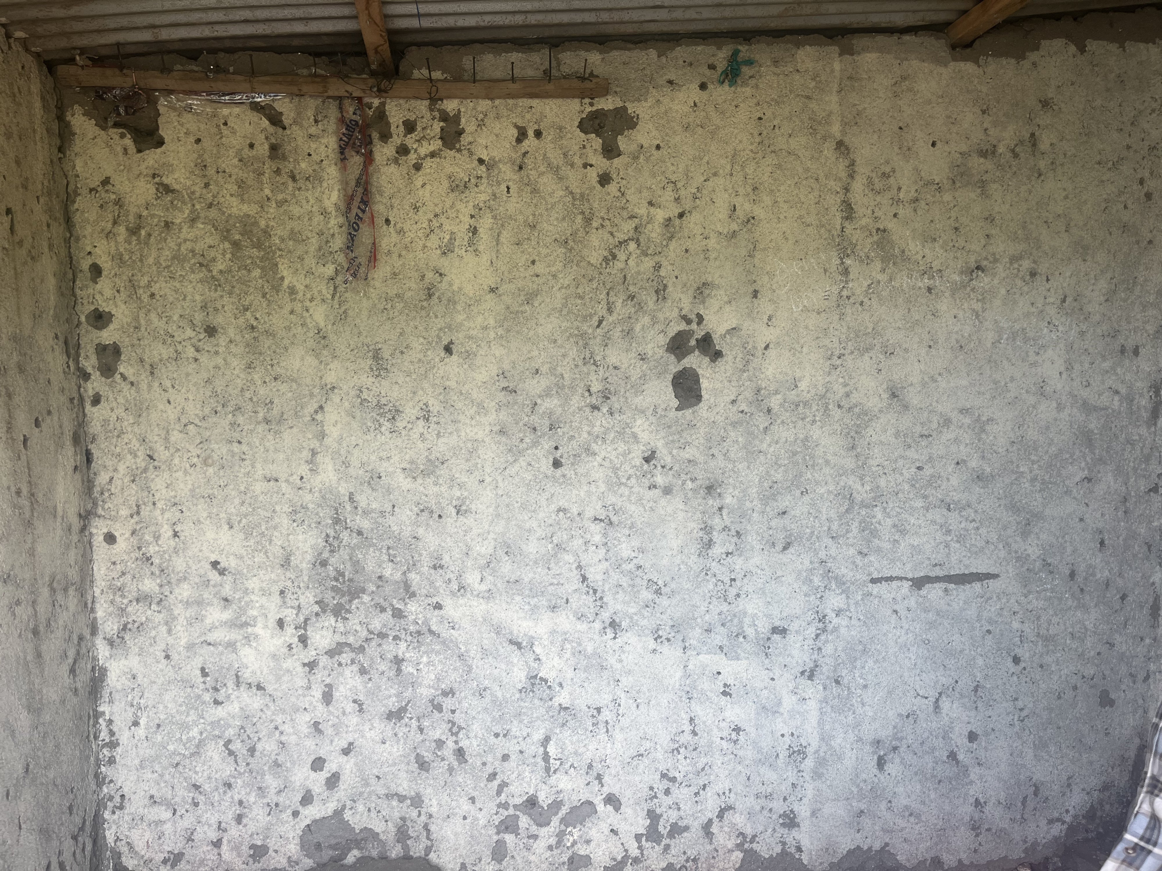 The bullet-ridden wall of a house where M23 fighters and Rwandan forces shot and killed four youths, Uvira, South Kivu province, Democratic Republic of Congo, March 16, 2026.