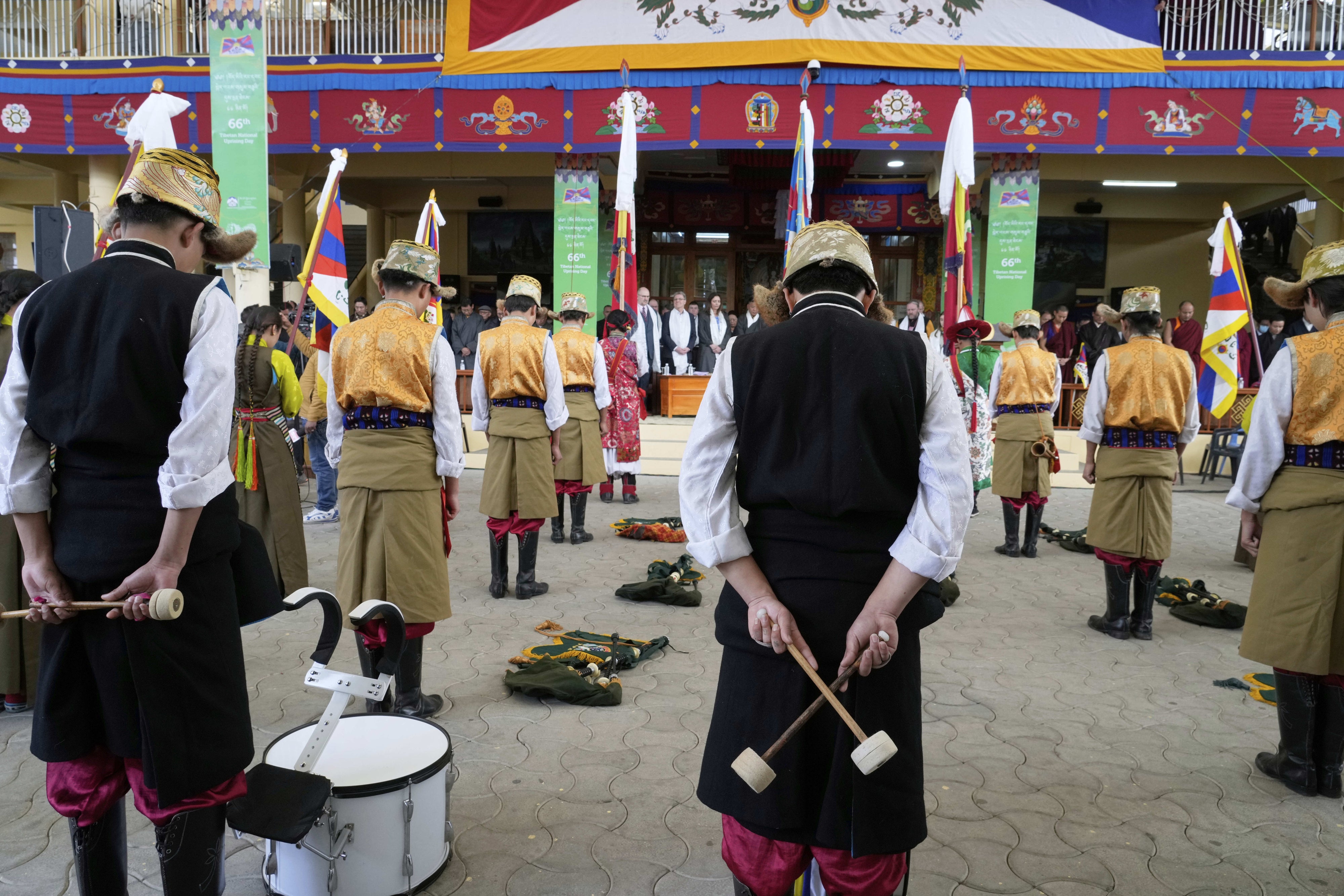 Exiled Tibetan artists observe a minute's silence as they mark the 66th anniversary of an uprising in Tibetan capital Lhasa, at the Tsuglakhang temple in Dharamshala, India, March 10, 2025.