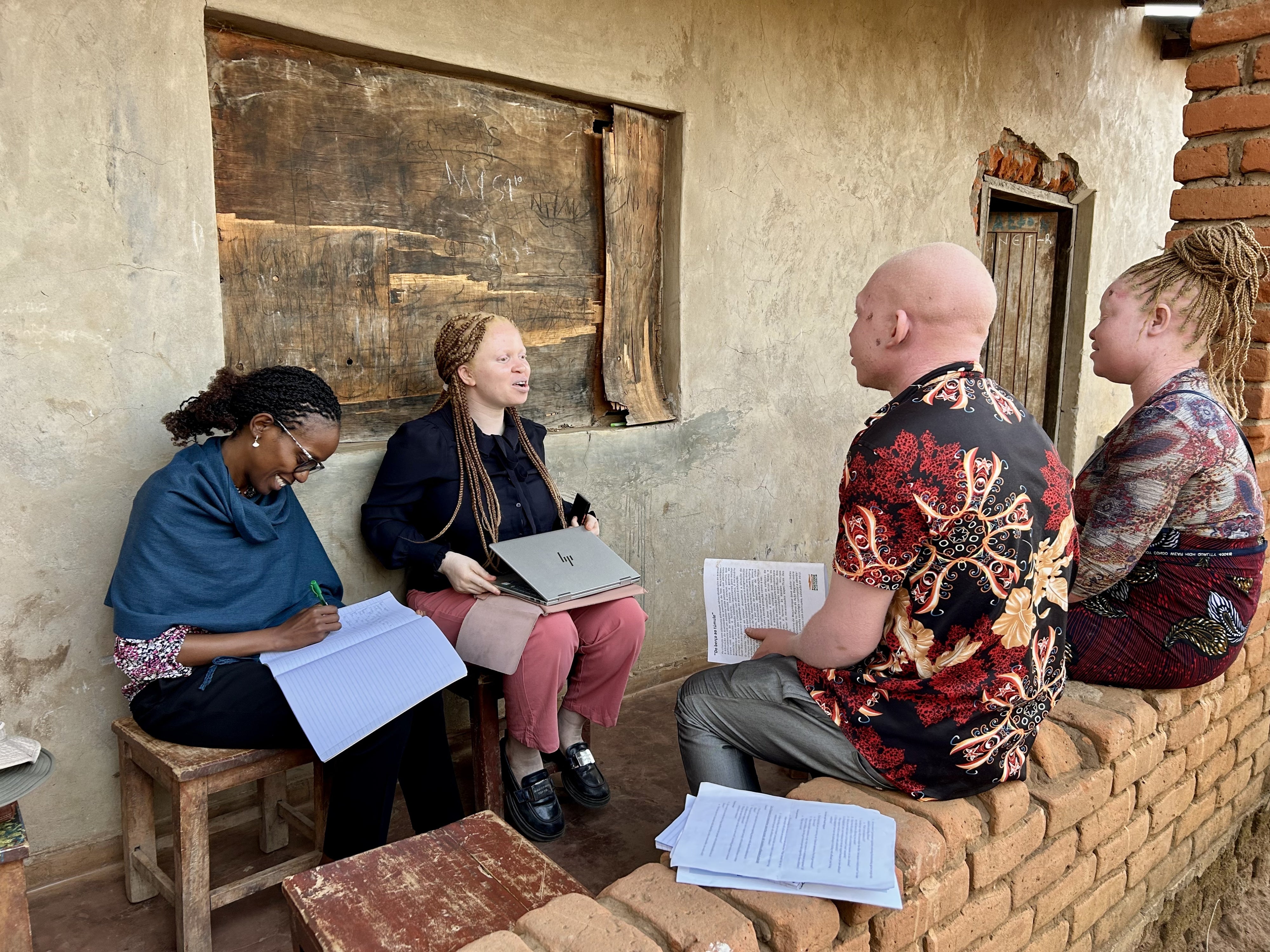 Human Rights Watch Director of the Disability Rights Division, Elizabeth Kamundia (left), and Marco Bristo Fellow for Courageous Leadership in Disability Rights, Hilda Macheso (center), interview people in Malawi, October 2025. 