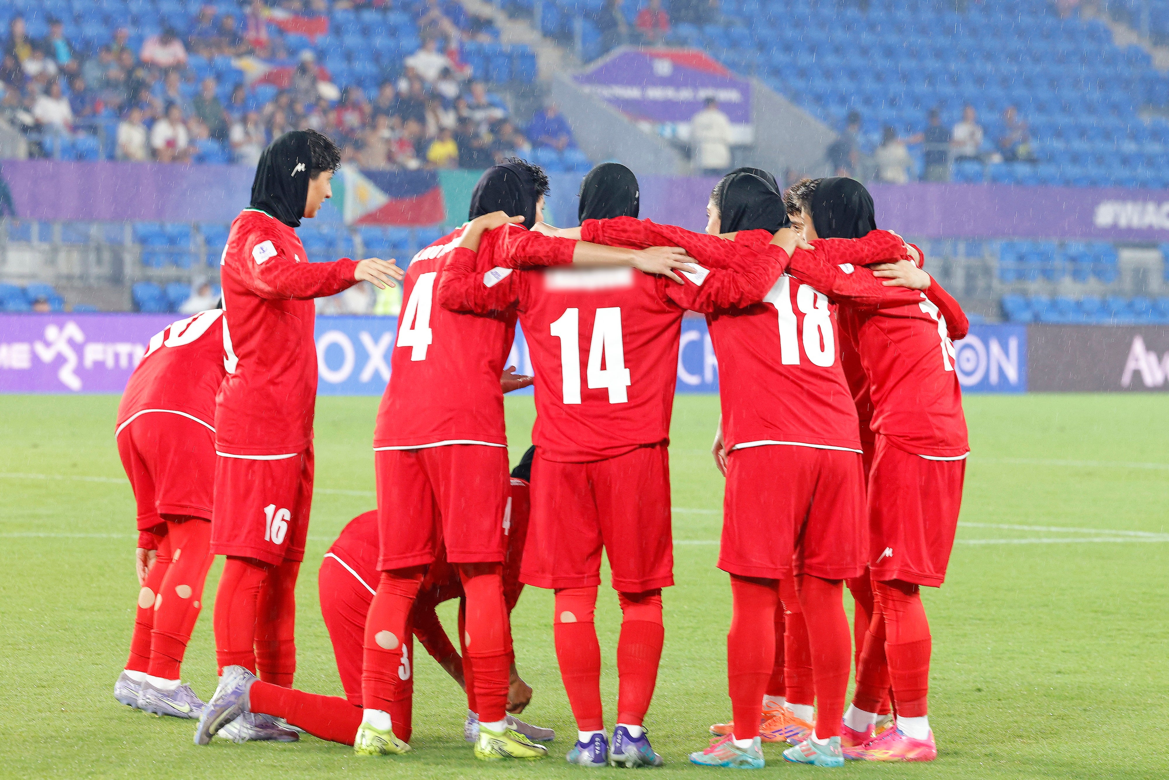Iranian players huddle before the AFC Women's Asian Cup Australia 2026 football match between Iran and the Philippines on the Gold Coast on March 8, 2026.