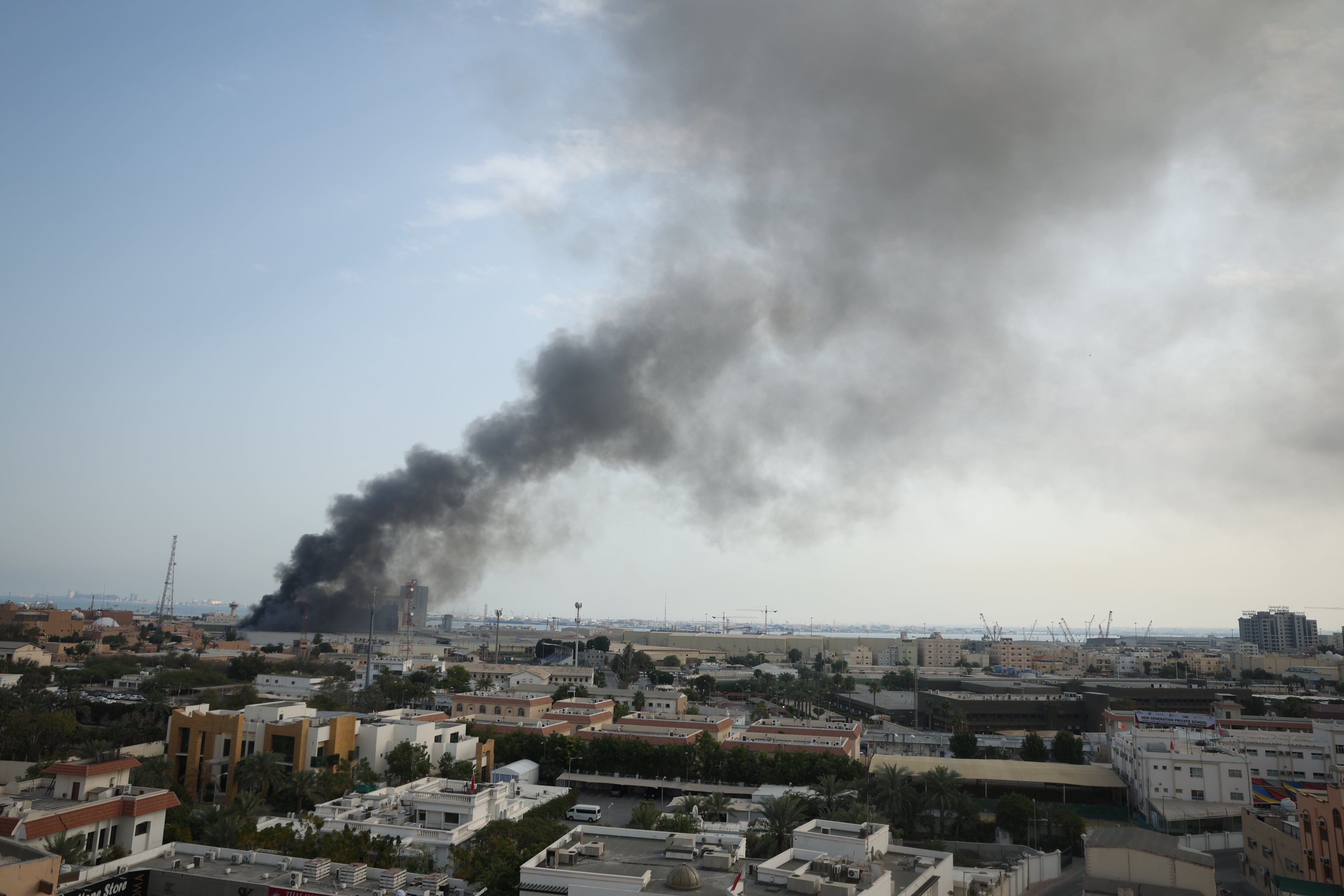 Smoke rises after Iran launched a missile attack targeting the headquarters of the US Navy Base in Manama, Bahrain about 3 mi/5 km away from Dry Rock Prison, February 28, 2026. 