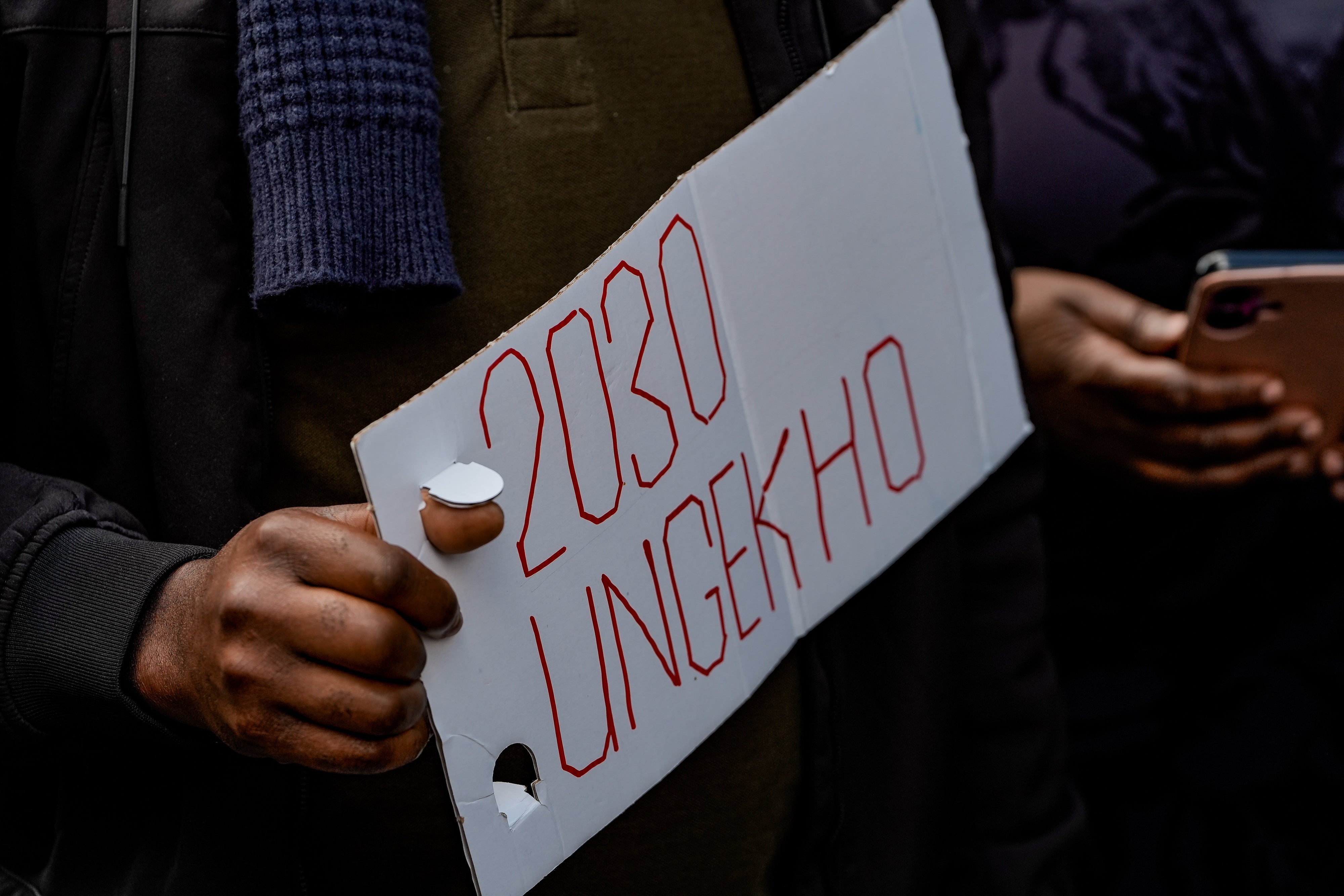 People protest the proposed Zimbabwe constitutional amendment extending the presidential term, London, April 18, 2026.