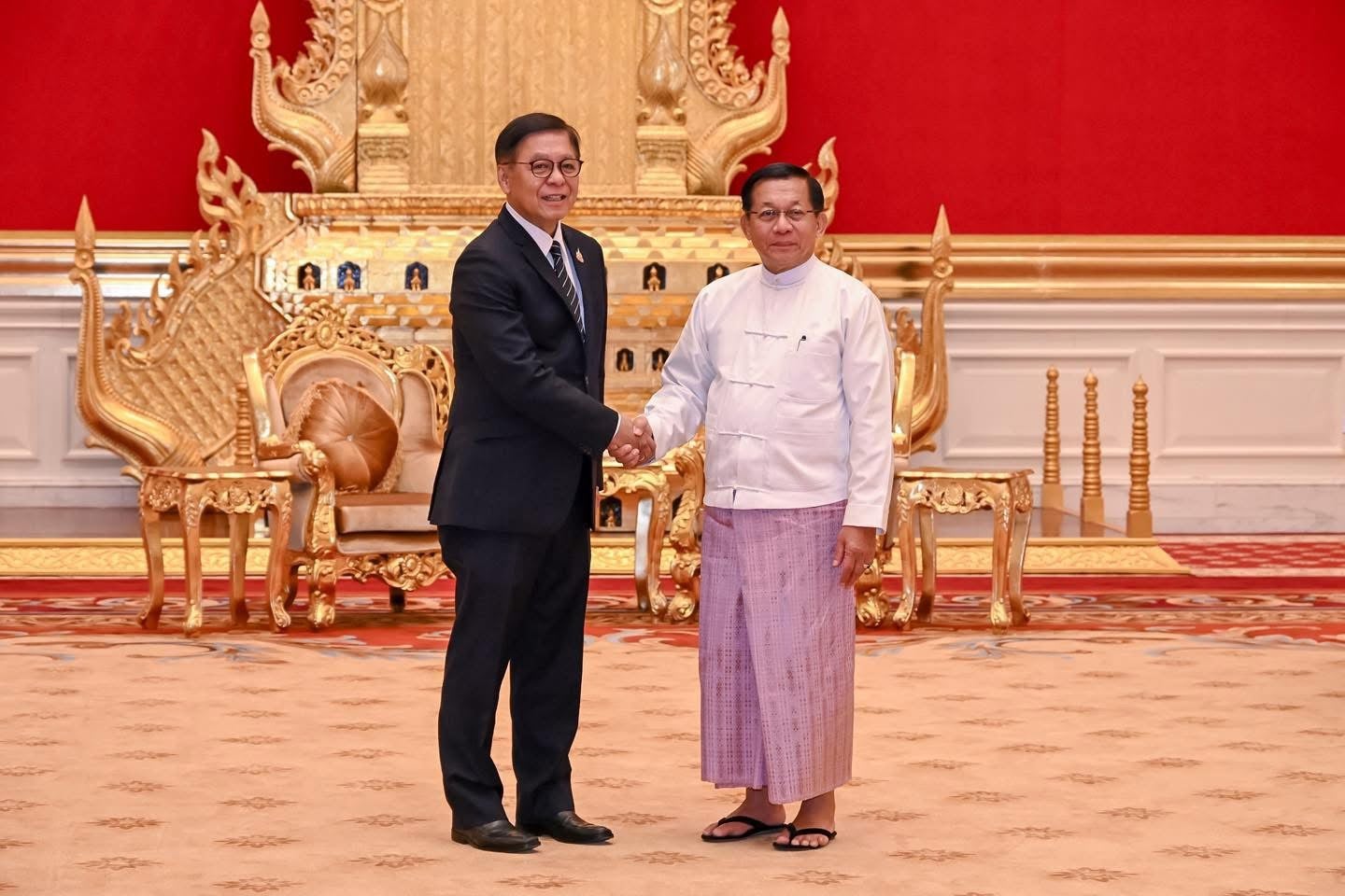 Thailand's Foreign Minister Sihasak Phuangketkeow (left) meets with Myanmar President Min Aung Hlaing in Naypyidaw, Myanmar, April 22, 2026.