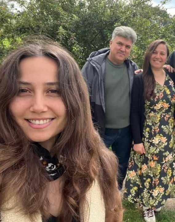 Environmental activist Esra Isik, with her parents.