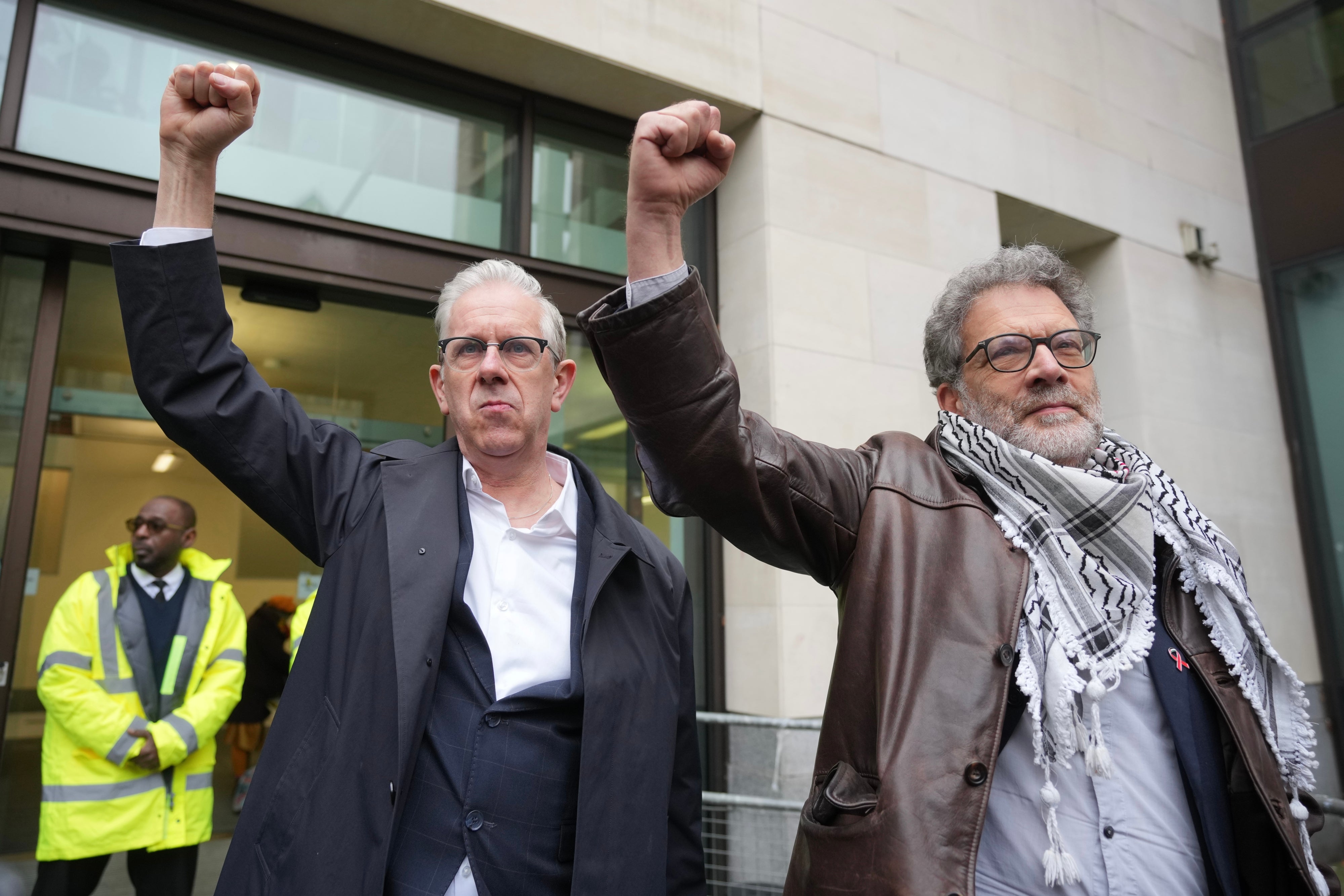 Ben Jamal and Chris Nineham, standing outside courthouse