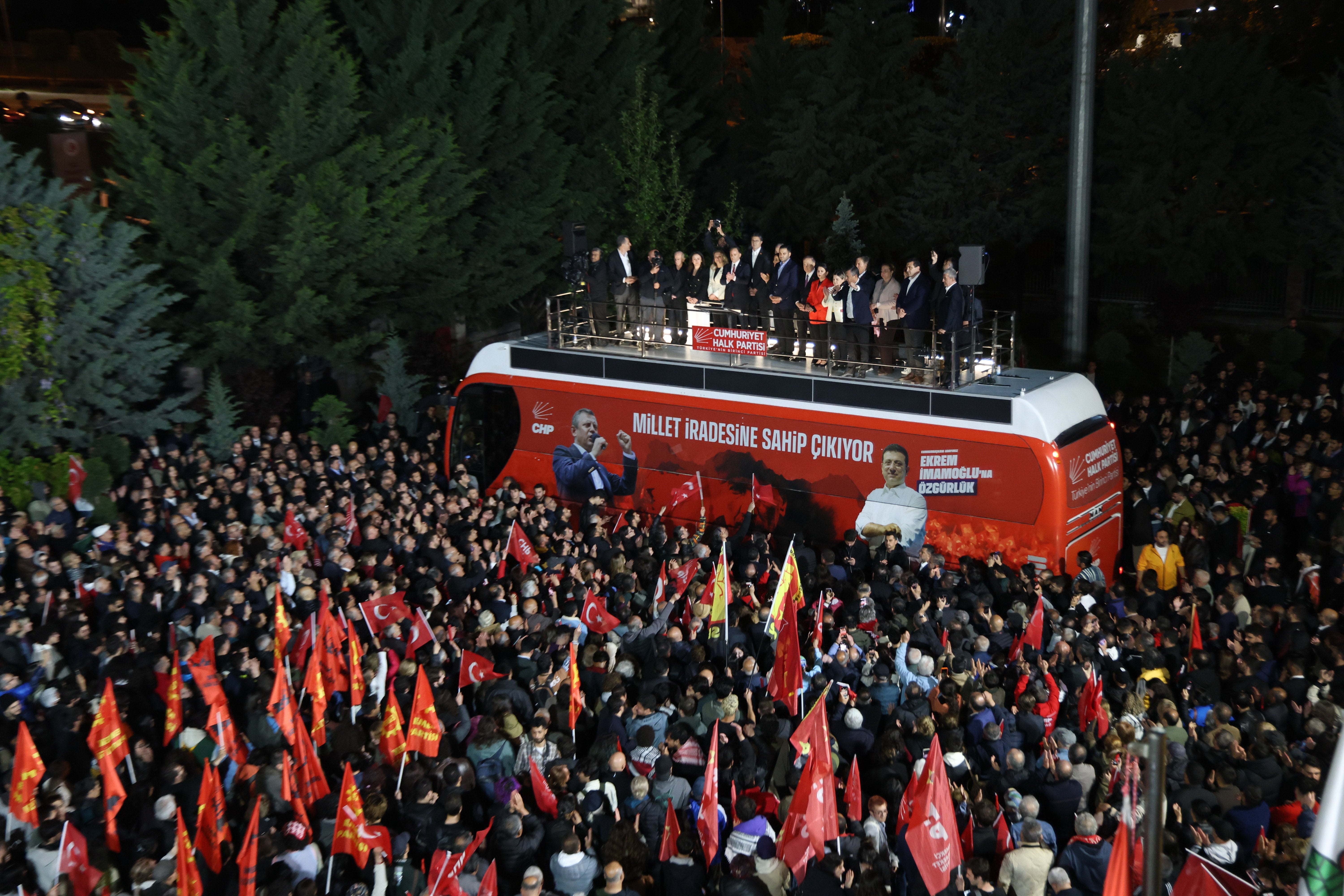 Özgür Özel addresses supporters outside the Republican People's Party (CHP) headquarters in Ankara after a court decision to remove him as party leader, May 21, 2026.